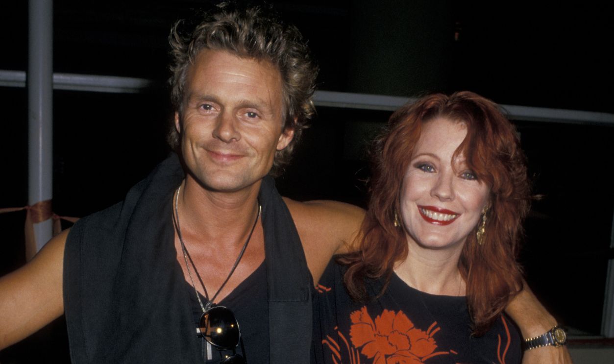 Actor Michael Des Barres and wife Pamela Des Barres attend the premiere of 'Hail! Hail! Rock N Roll!' on October 8, 1987 at the AMC 14 Theater in Century City, California. 