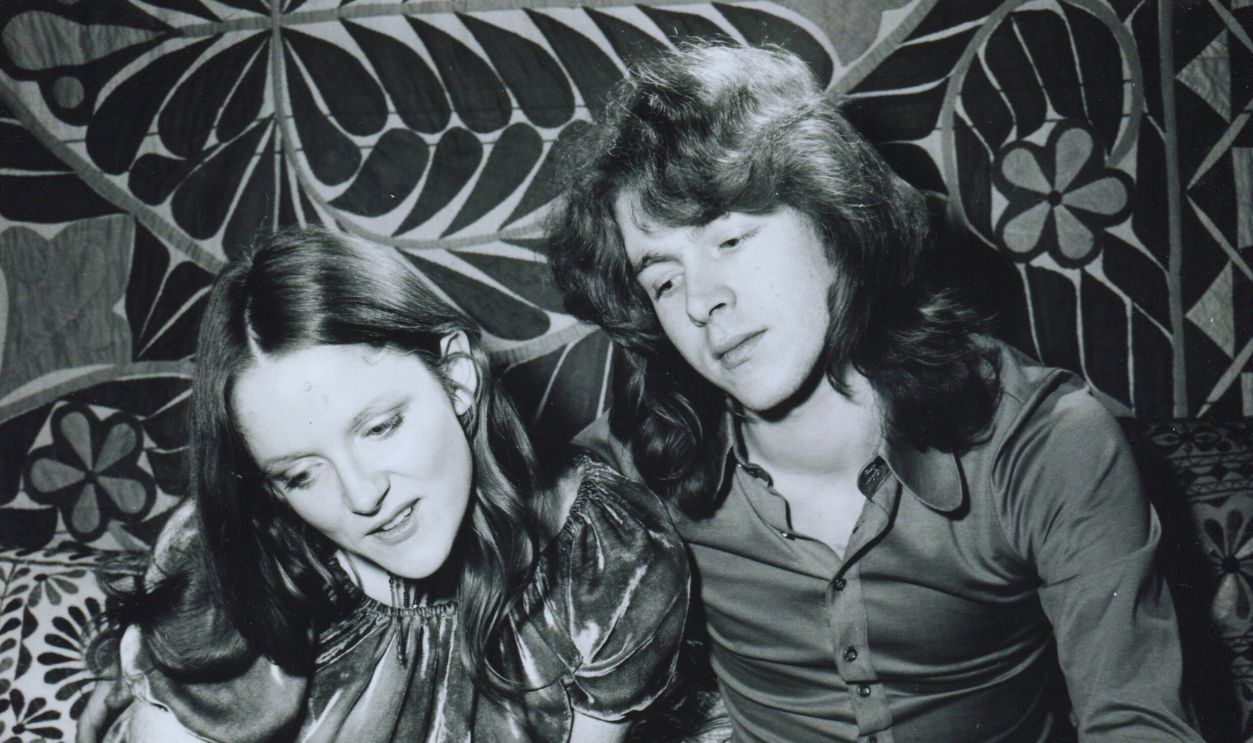 Gettyimages - 607237993, Portrait Of Mick Taylor & Family Portrait of British musician Mick Taylor and his wife, Rose Millar, as they pose with their nine-day old daughter, Chloe, January 15, 1971. 