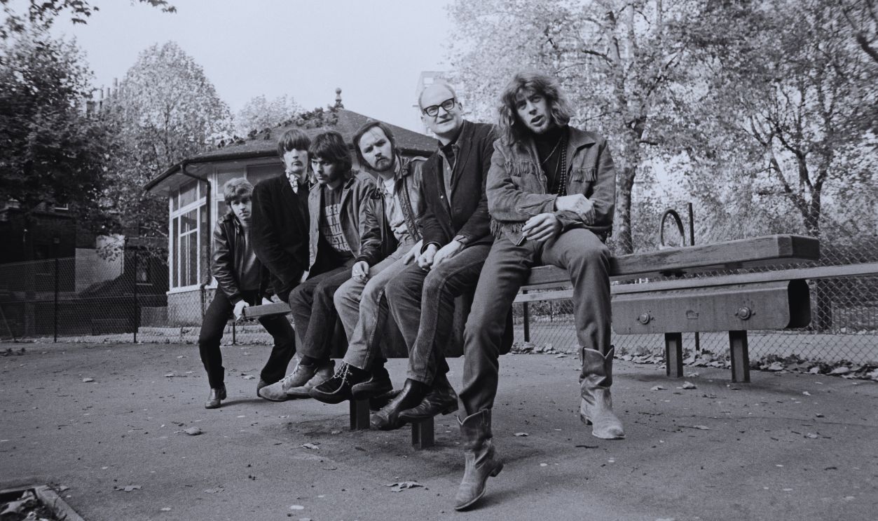 Gettyimages - 1465998400, John Mayall And The Bluesbreakers English musician John Mayall with members of his band, The Bluesbreakers posed together on a playground seesaw in London in November 1967. Members of the group are, from left, Mick Taylor, Chris Mercer, Keith Tillman, Keef Hartley (1944-2011), Dick Heckstall-Smith (1934-2004) and John Mayall.