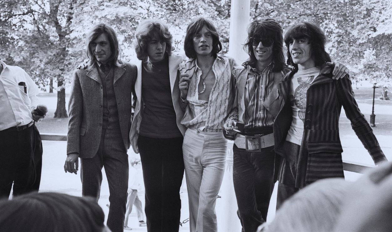 Gettyimages - 514703588, New Rolling Stones Line-Up (Original Caption) LONDON-6/13/69-: Here is the new Rolling Stones line-up. Mick Taylor (second from left), a young lead guitarist, has just joined the pop group in place of Brian Jones, who quit after disagreement on music policy. The group is shown Hyde Park. Left to Right: Drummer Charlie Watts, Mick Taylor, lead singer Mick Jagger, guitarist Keith Richard and bass-player Bill Wyman.
