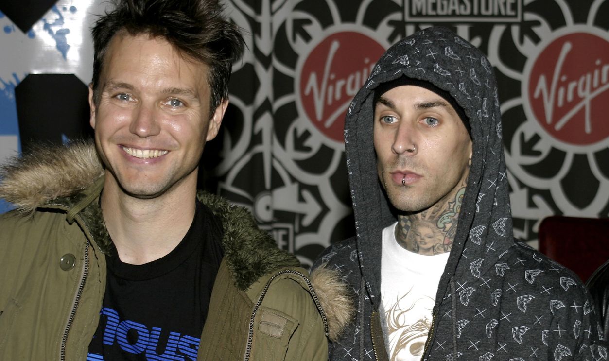 (+44) Signs Copies of Their CD