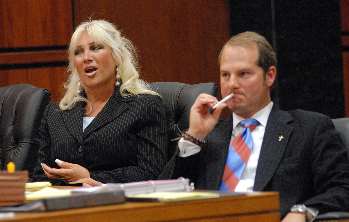 Linda Bollea (Hogan) (L) and her attorney Ray Rafool (R) listen to testimony in the divorce hearing against her estranged husband, Hulk Hogan (Terry Bollea) on June 15, 2009 in Clearwater, Florida. 