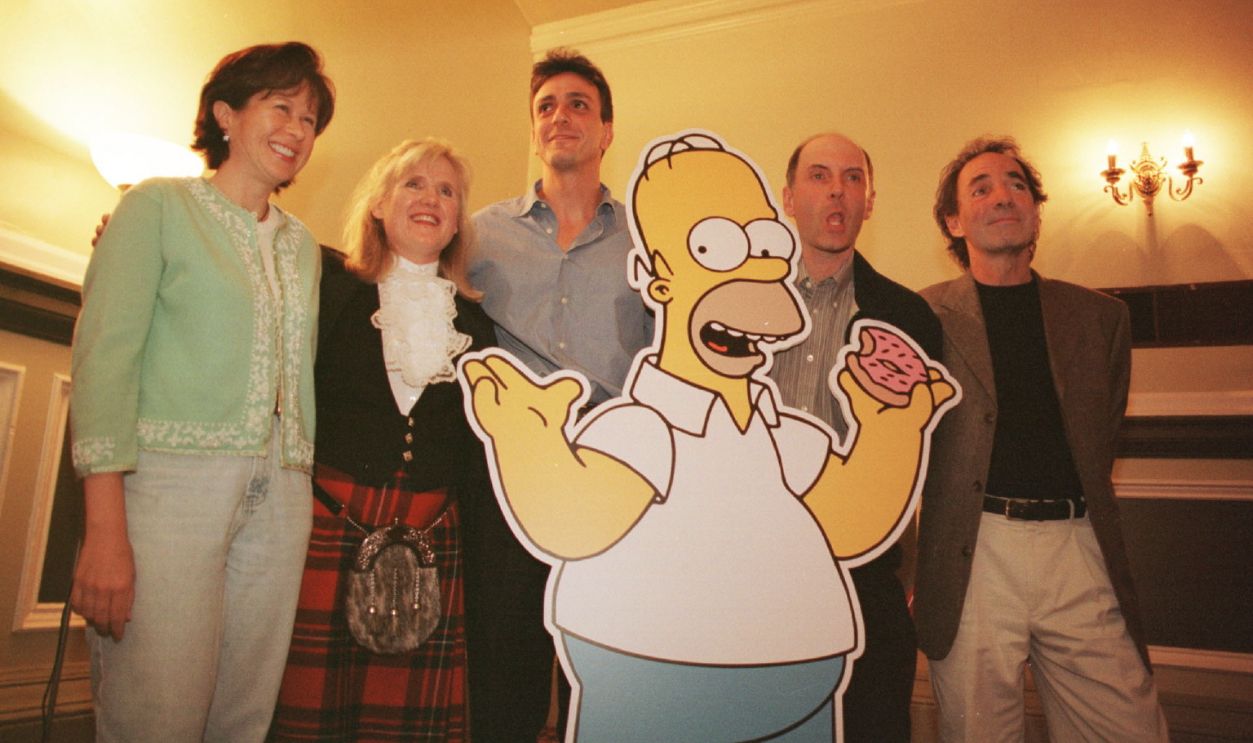 Dan Castellaneta, who is the voice of Homer Simpson, with (L to R) Yeardley Smith, Lisa's voice; Nancy Cartwright, Bart's voice; Hank Azaria, Moe's voice; and Harry Shearer, Mr Burns's voice. 