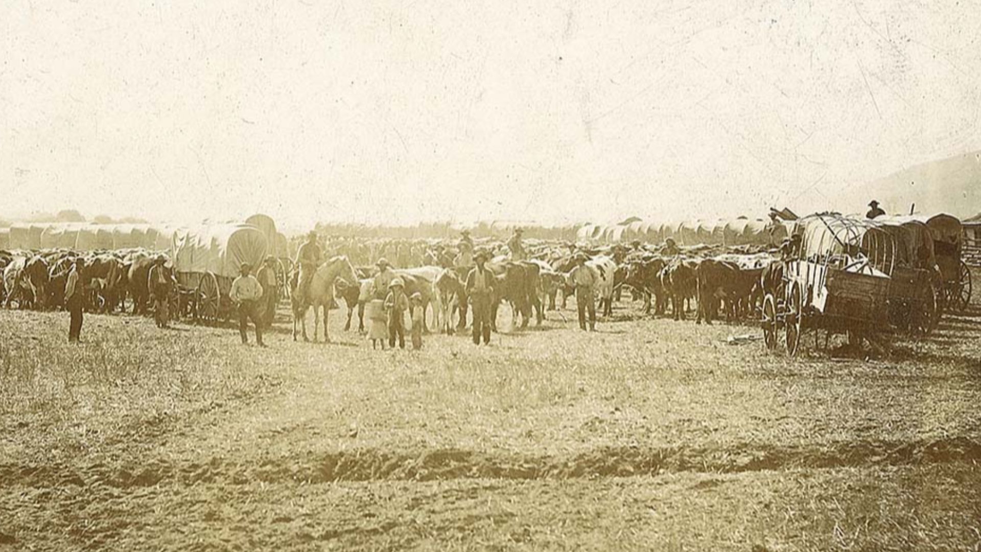 File:Pioneers and covered wagons.jpg