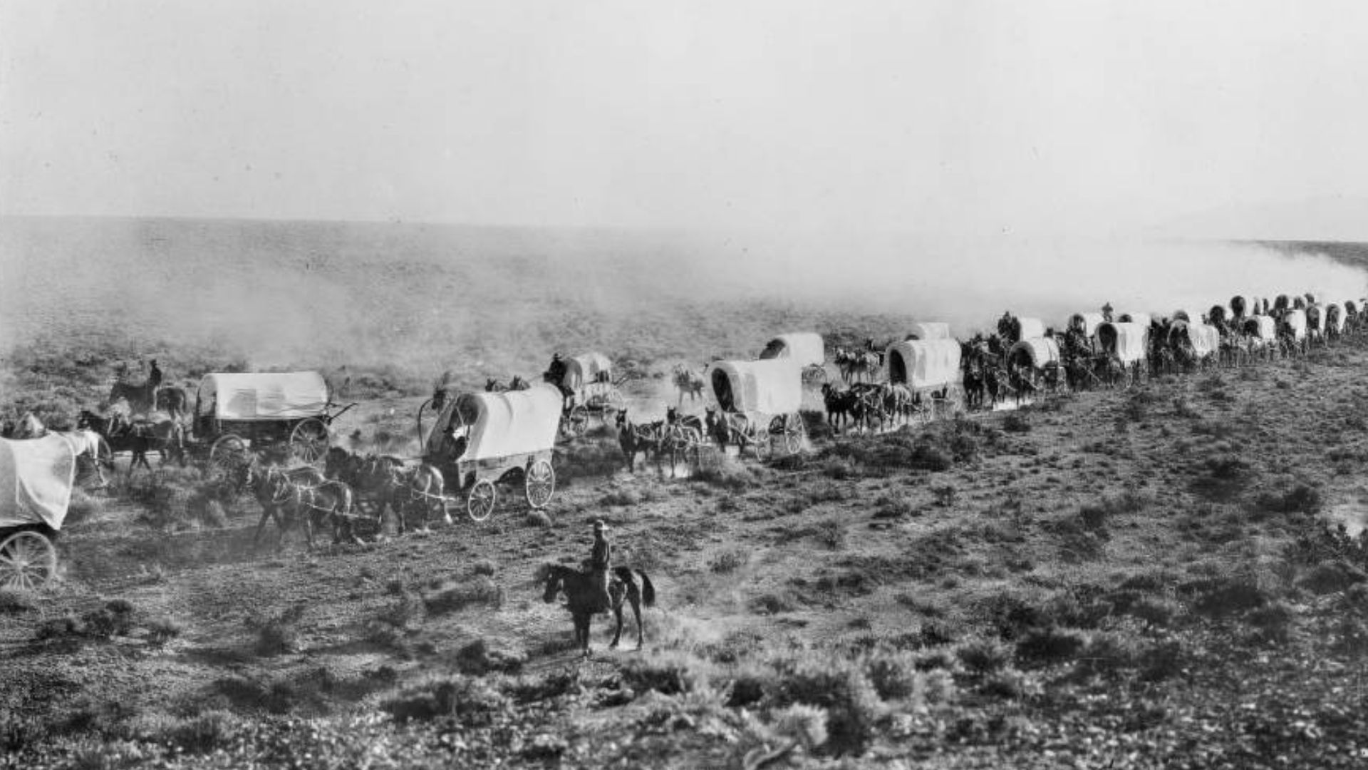 File:Train of covered wagons on the Santa Fe Trail.jpg
