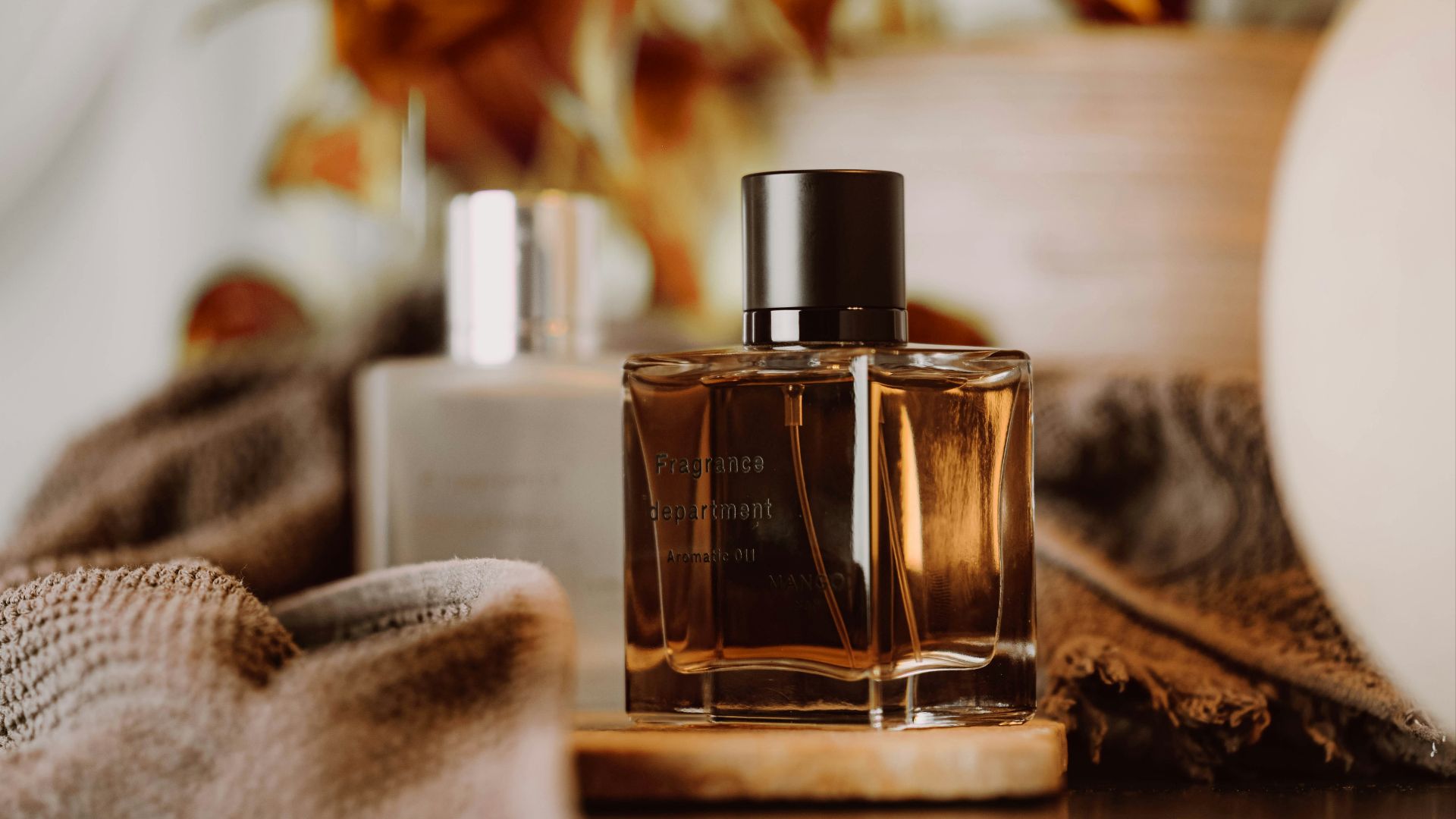 a bottle of perfume sitting on top of a table