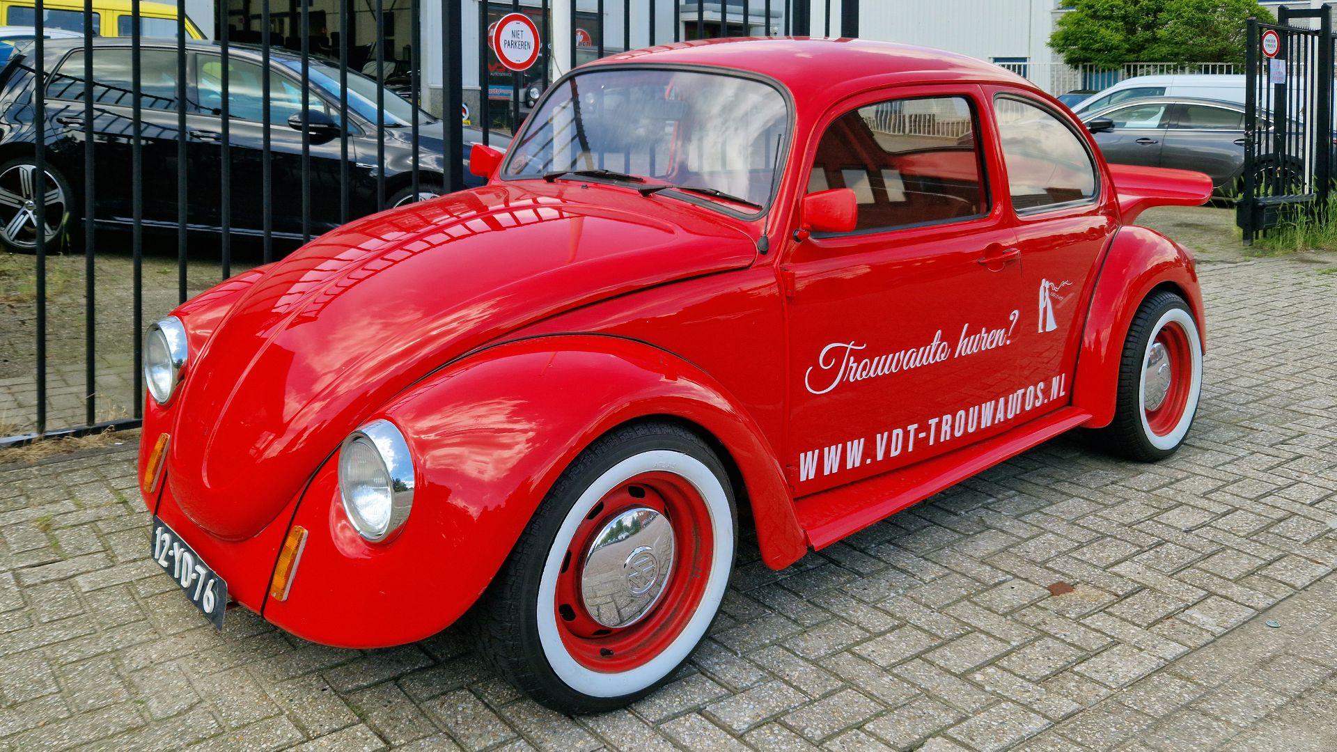 File:Red Volkswagen Beetle three-quarter front view.jpg