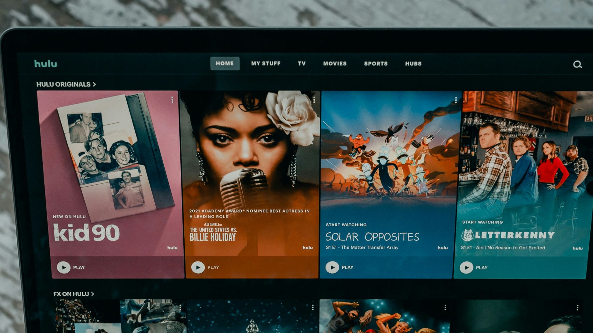 macbook pro on white table