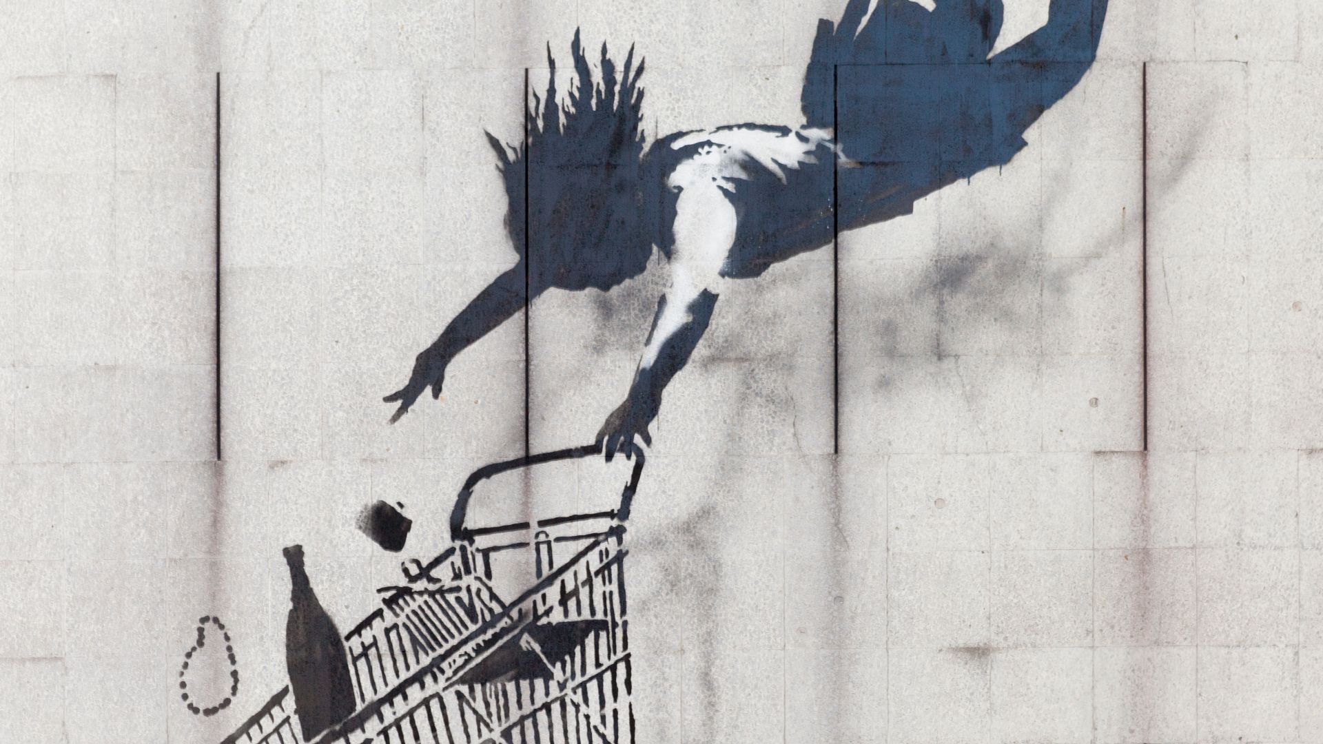 File:Shop Until You Drop by Banksy.JPG