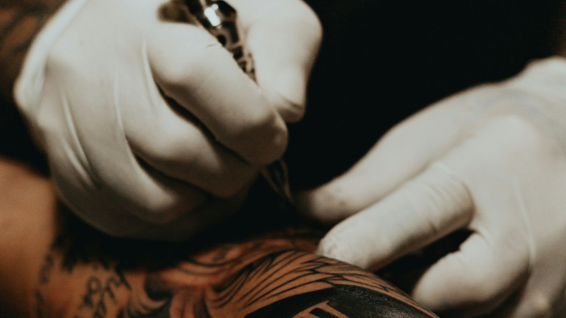 person doing tattoo