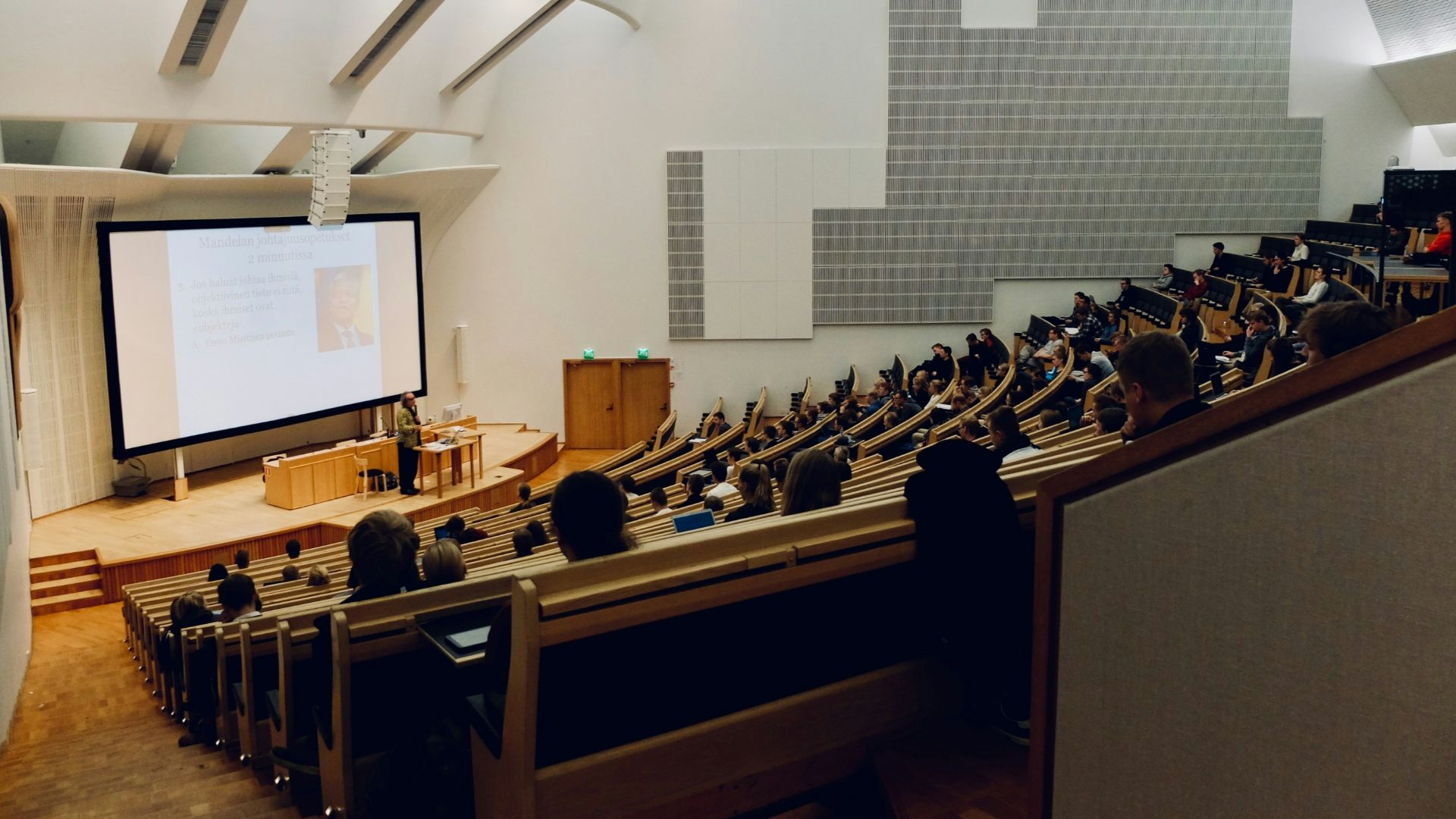 people sitting on chair in front of computer