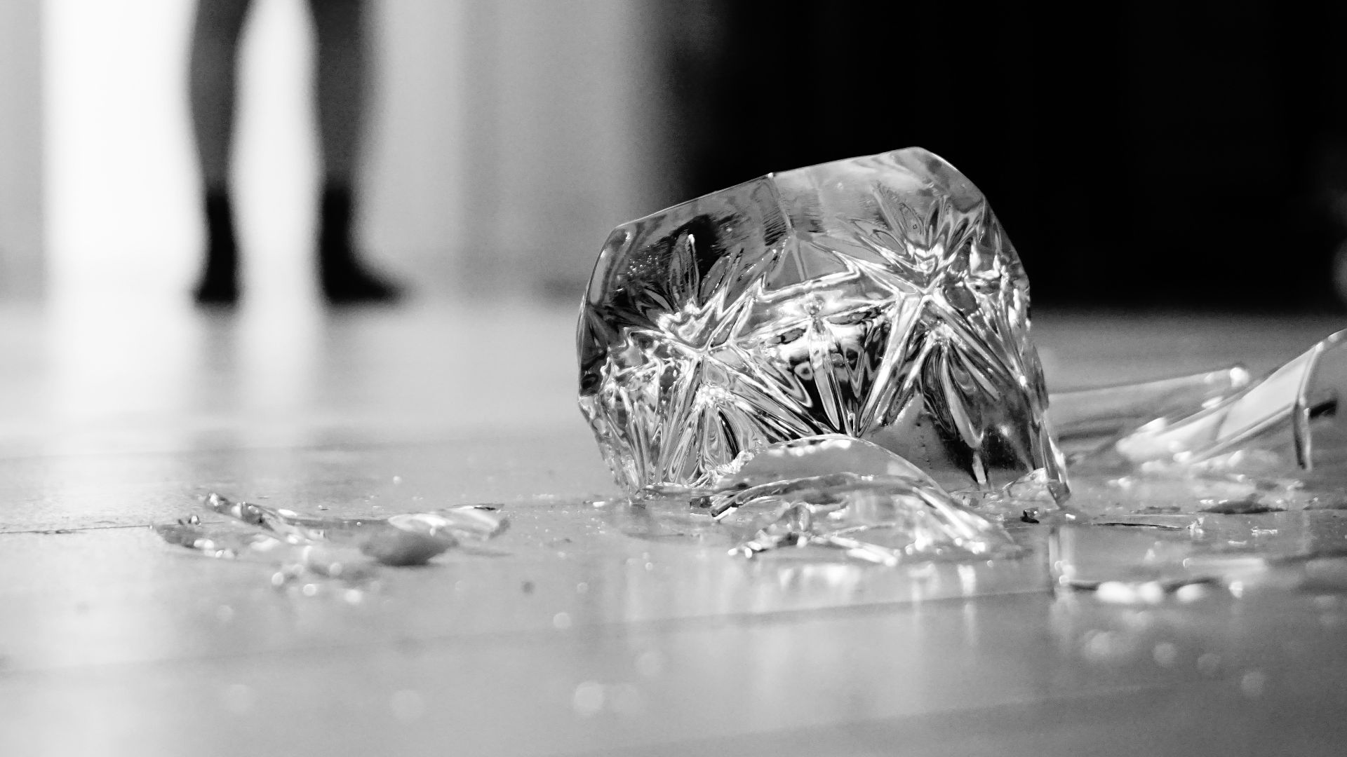 a broken glass on the floor