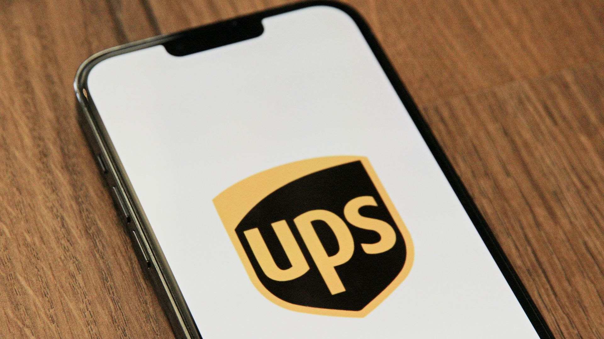 a phone with the ups logo on it