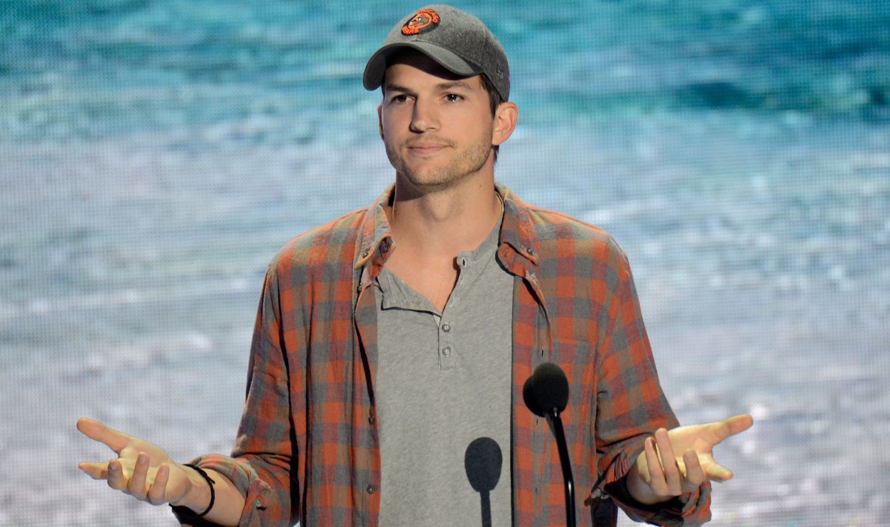  Actor Ashton Kutcher speaks onstage at the 2013 Teen Choice Awards at Gibson Amphitheatre on August 11, 2013 in Universal City, California. 
