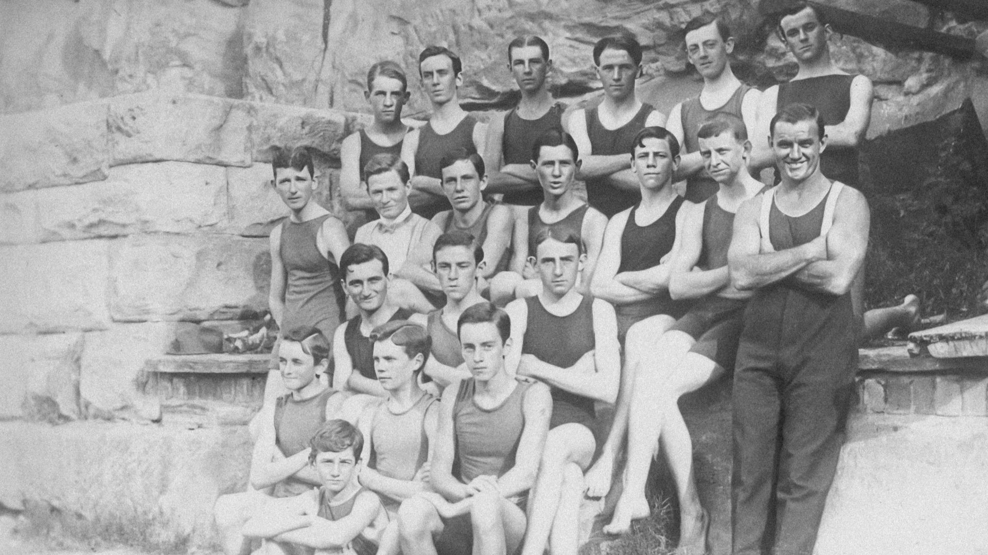 a black and white photo of a group of men