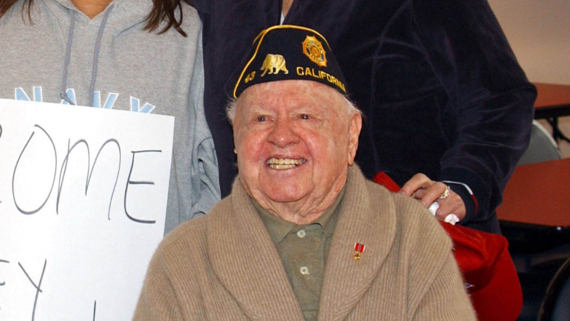 File:US Navy 061103-N-8102J-057 Legalman 1st Class Chris Holt and his wife takes a photo with film, stage and singing star, Mickey Rooney and his wife Jan during a visit at Mayport's United Services Organization (USO) office.jpg