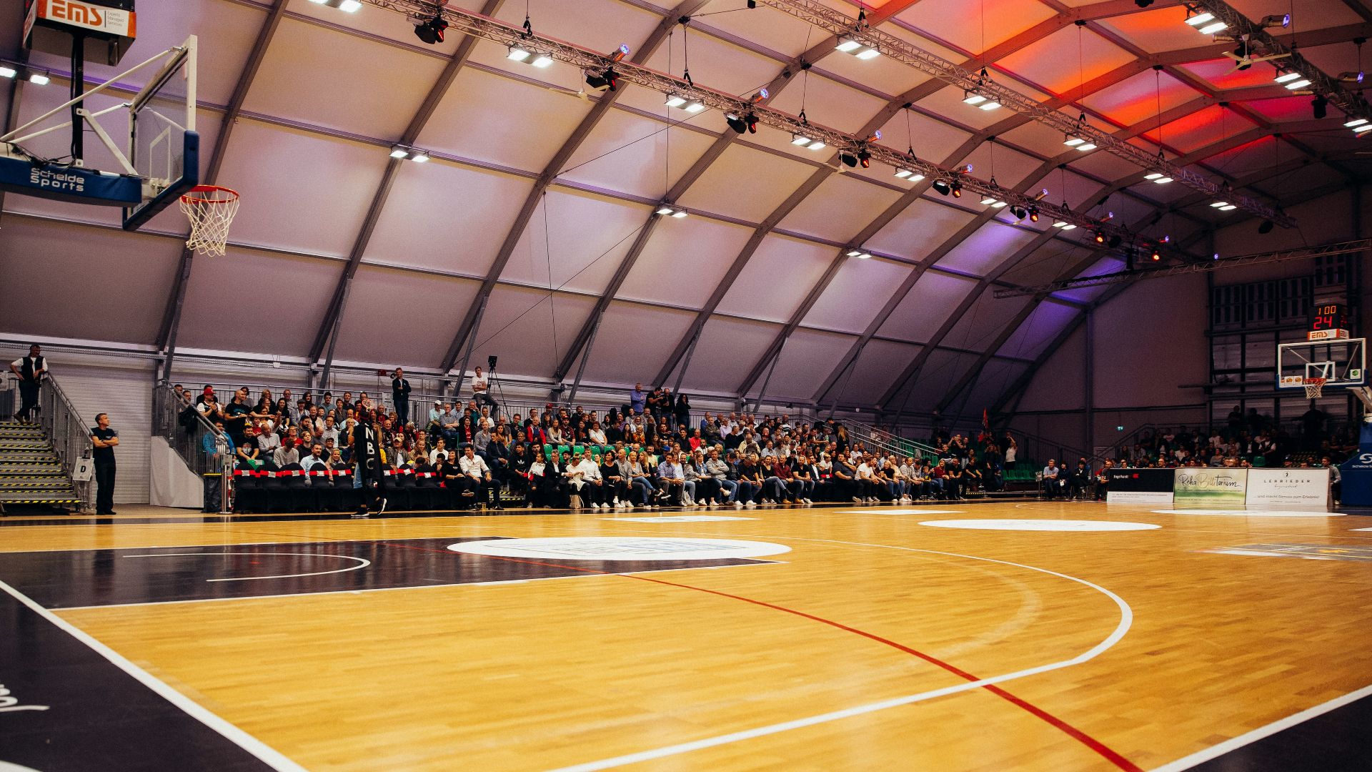 people inside a basketball gym