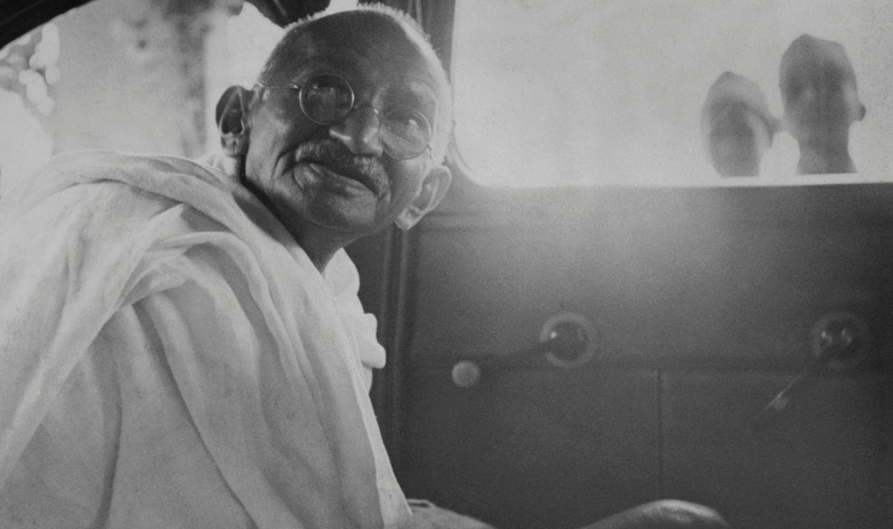 Simla Leaders Conference. Mahatma Gandhi leaving Viceregal Lodge, Simla in a Viceregal Car after his interview with his excellency the Viceroy Lord Wavell on 11th July, 1945. Gandhi; Mohandas Karamchand, known as Mahatma: (1869-1948) Indian leader, born in Porbandar, Kathiawar. He studied law in London, & in 1893 he have up a Bombay legal practice worth ?5000 a year to live on ?1 a week in South Africa, where he spent 21 years opposing discriminatory legislation against Indians. In 1914 he returnerd to India. While supporting the British in WW1, he took an increasing interest in the Home Rule movement (swaraj), over which he soon obtained a personal dominance, becoming master of the congress organization. His civil disobedience campaign of 1920 involved violent disorders. From 1922 to 1924 he was in jail for conspiracy & in 1930 he led a 200 mile march to t