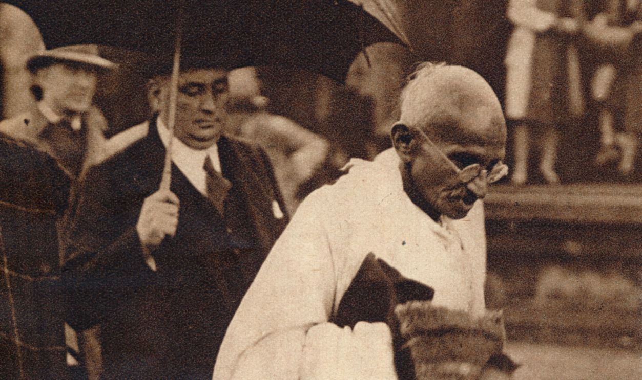 Gandhi in London', 1930, (1938). Gandhi visiting London for 'Round Table' conferences, September 1930. From These Tremendous Years 1919-1938. [Daily Express, London, 1938]