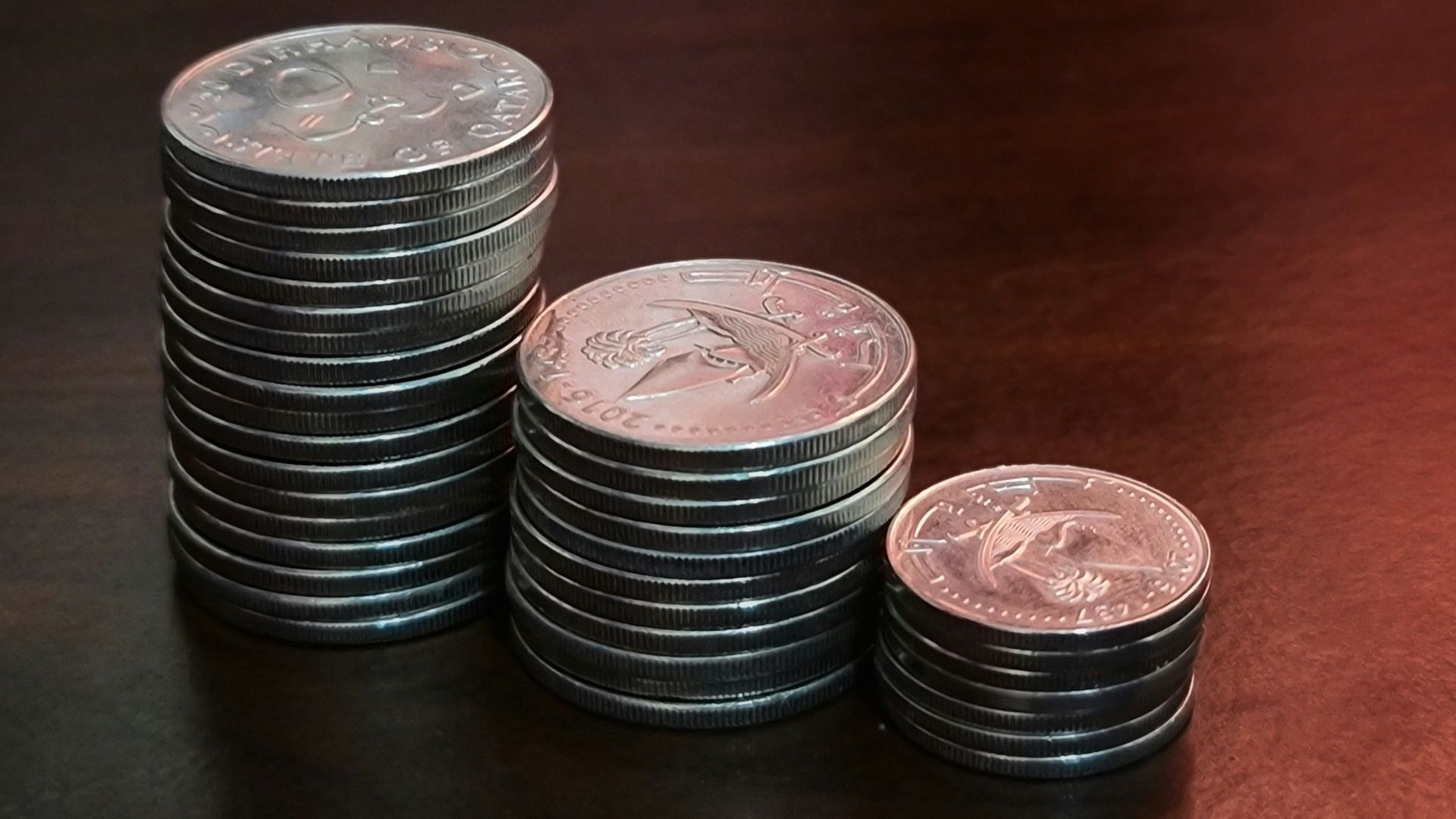 silver round can on brown wooden table