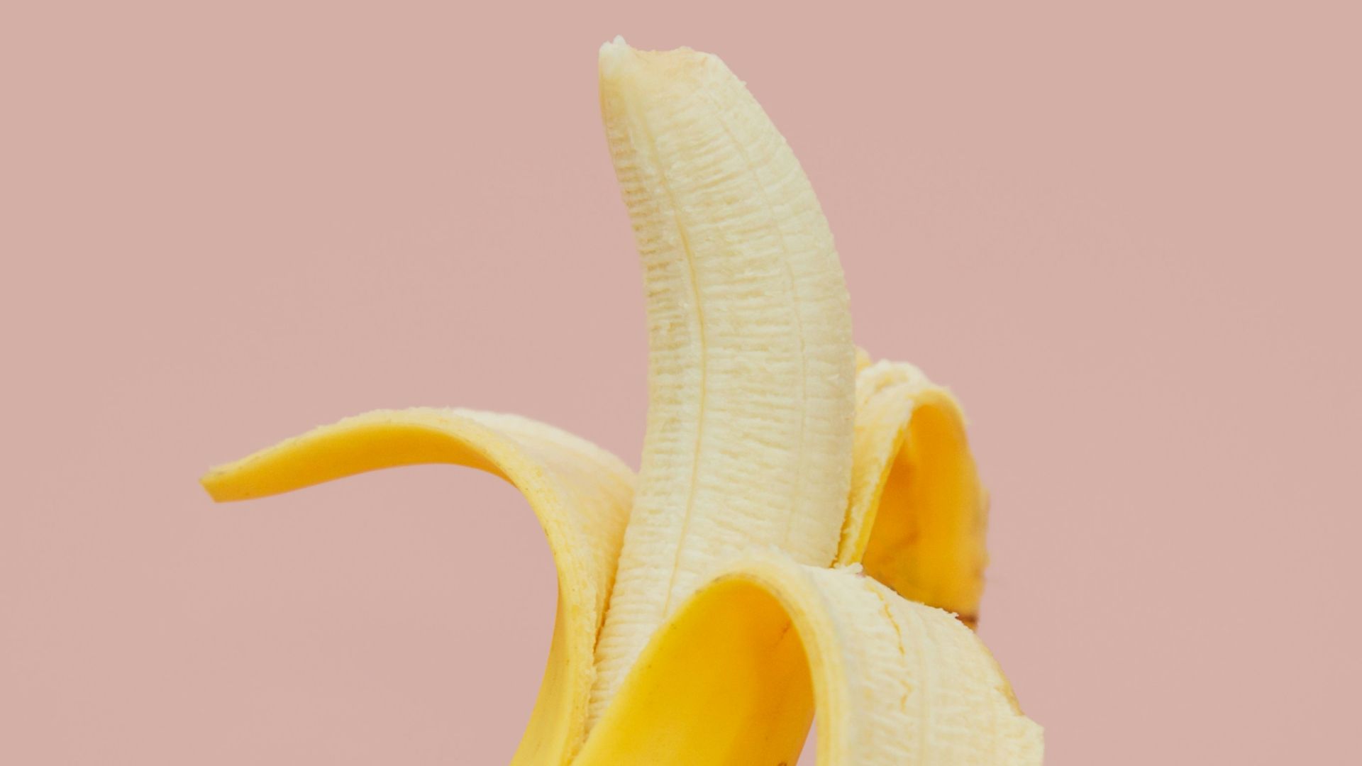 half peeled banana fruit