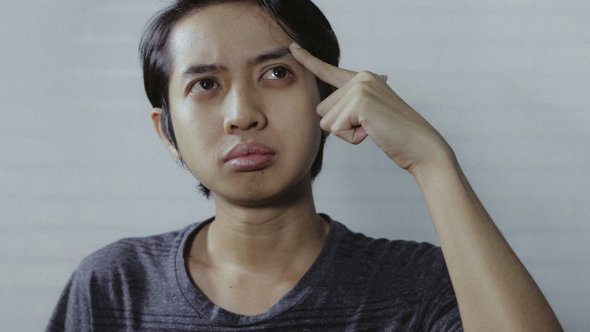 woman in gray crew neck shirt