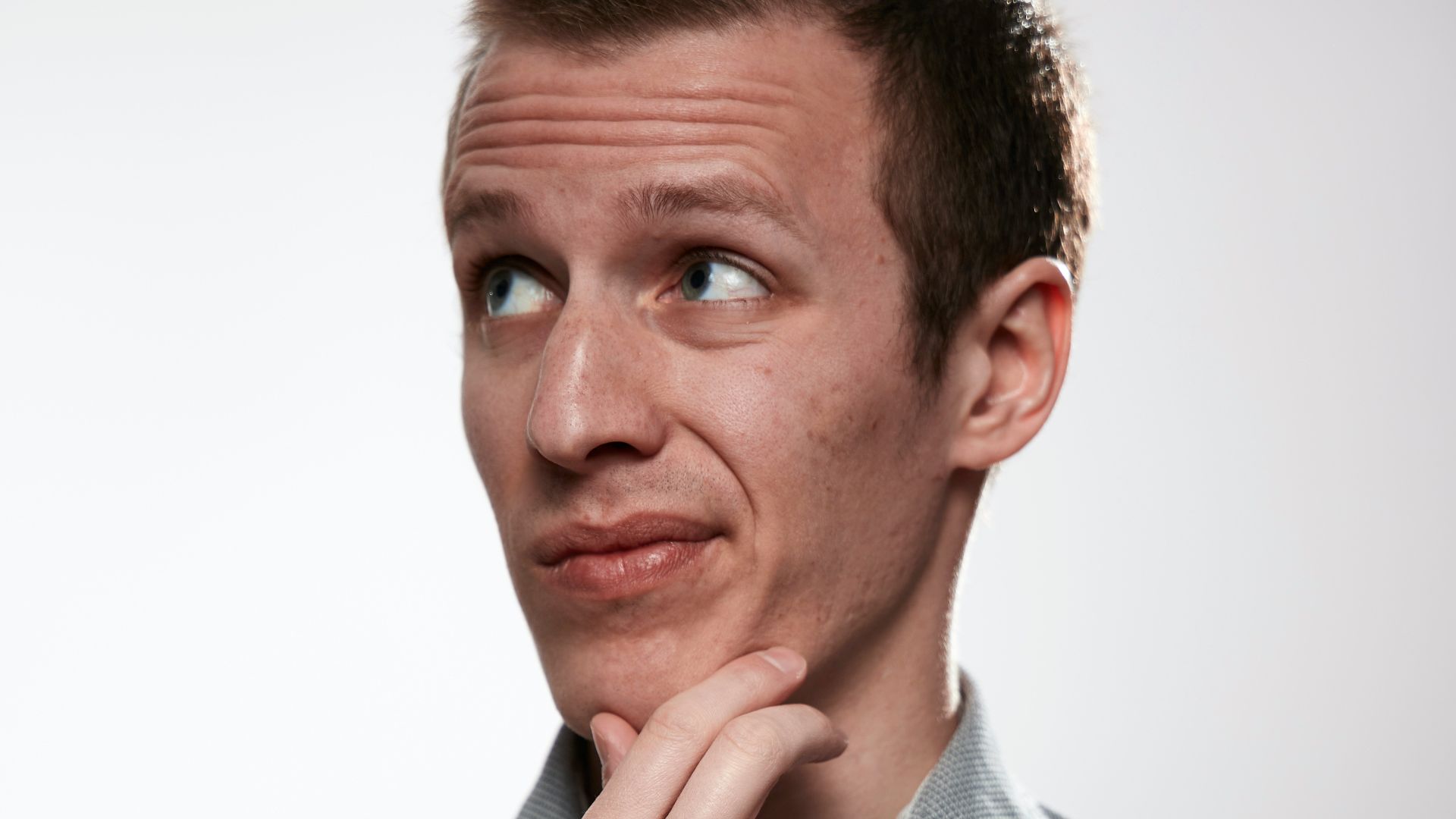 man in gray button up shirt
