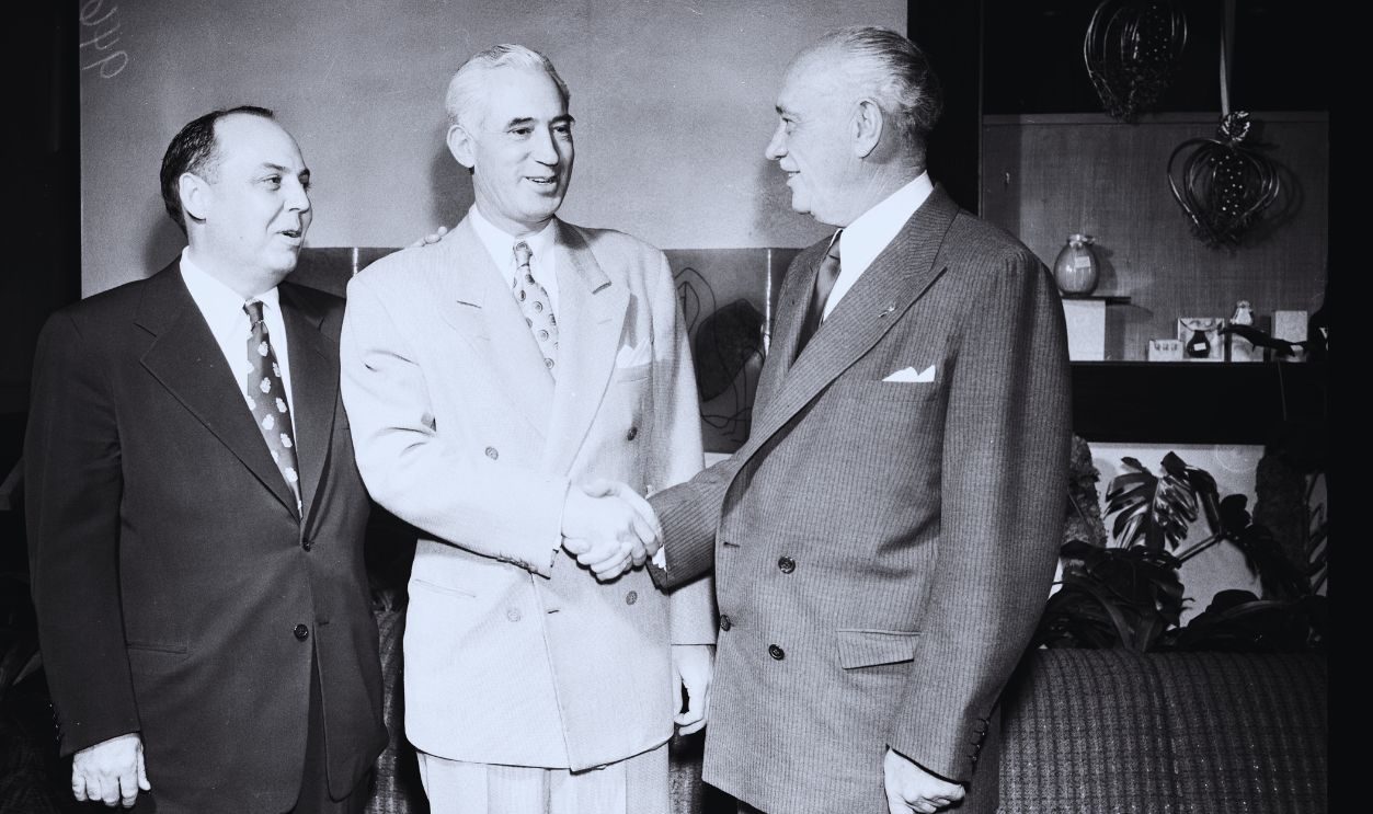  Gettyimages - 1048999118, Southern California Hotel Association meeting, 1952 Southern California Hotel Association meeting, 17 January 1952.;Supplementary material reads: 'Caption: (with Fredericks story) Southern Calif. Hotel Assn. mtg. L to R: James H. Alberts, outgoing President;W.A Porter, newly installed President;Conrad N Hilton, speaker at the meeting'..