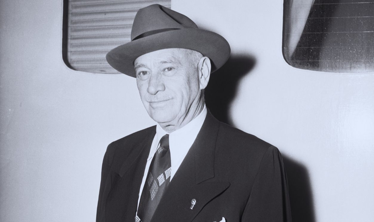Gettyimages - 515332468, Conrad Hilton, Sr., Returning to US (Original Caption) 11/20/1950- New York, NY: Close-up of Conrad Hilton, Sr., President of the Hilton Hotel Company, as he returns from a business trip in Europe aboardthe SS America of the United States Lines.