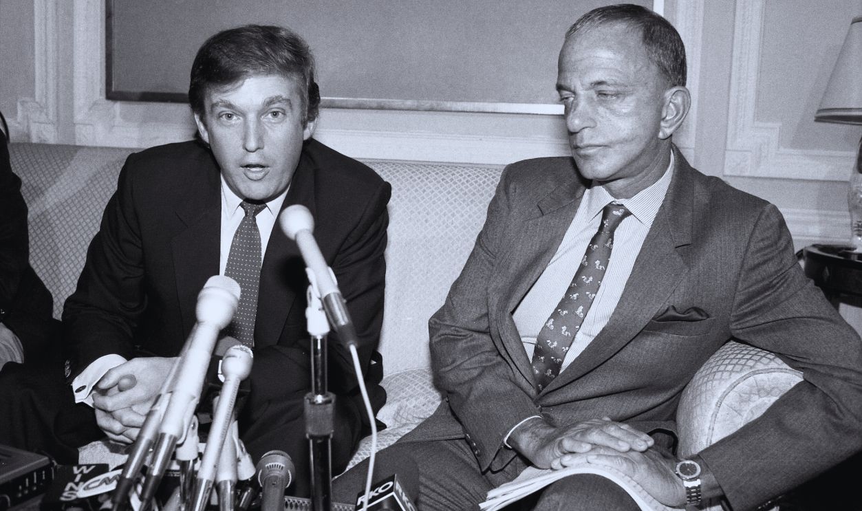 Gettyimages - 578551334, Donald Trump Donald Trump (L), owner of the New Jersey Generals, of the U.S. Football League, said 10/18 his league’s $1.32 billion antitrust suit against the national Football League will crack “one of the great monopolies in the is country.” At right is his attorney Roy Cohn. 