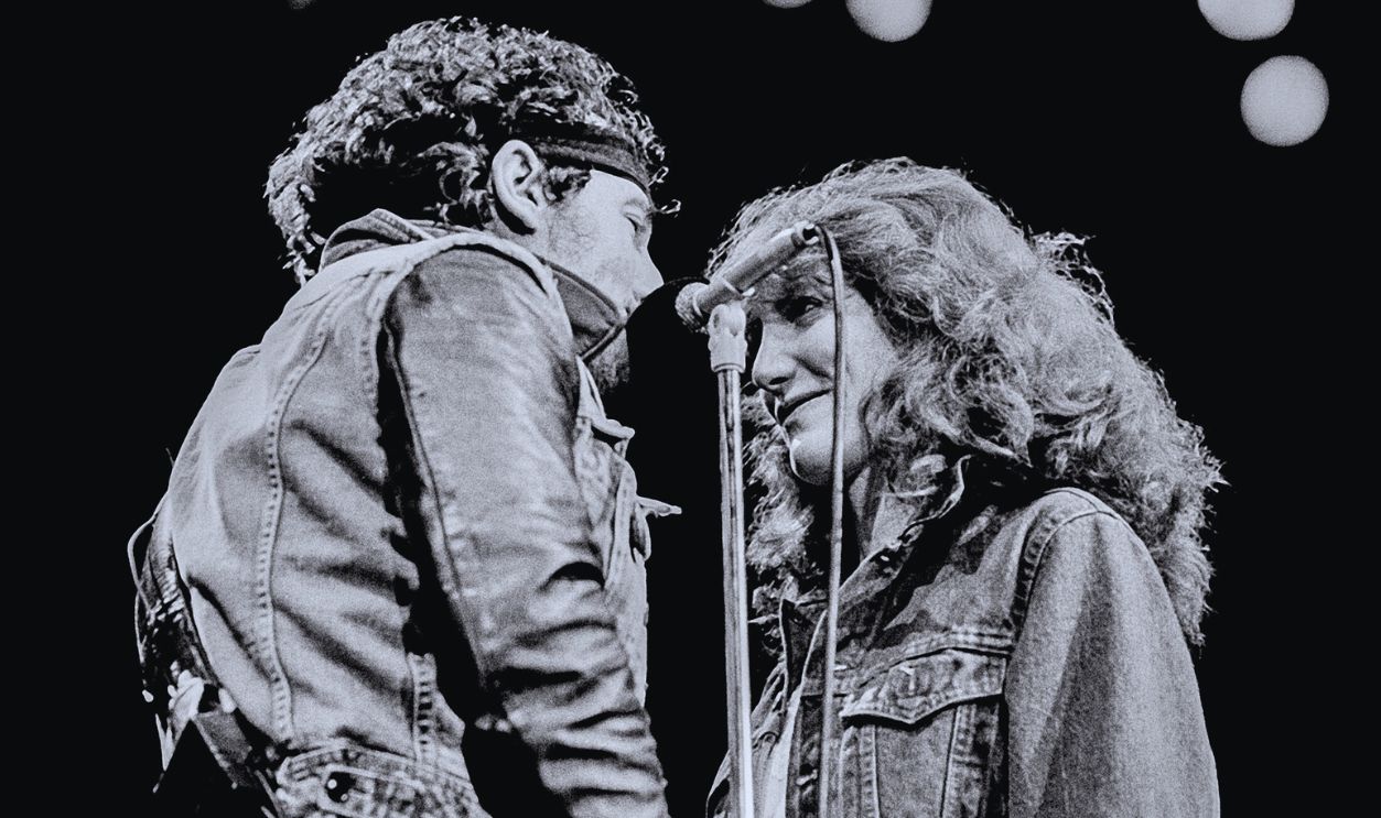 Gettyimages - 2167028778, Musician Bruce Springsteen In Concert Musician and Singer Bruce Springsteen and Singer Patti Scialfa with E Street Band perform in concert at Los Angeles Sports Area during the Born in the USA Tour, October 25, 1984 in Los Angeles, California.