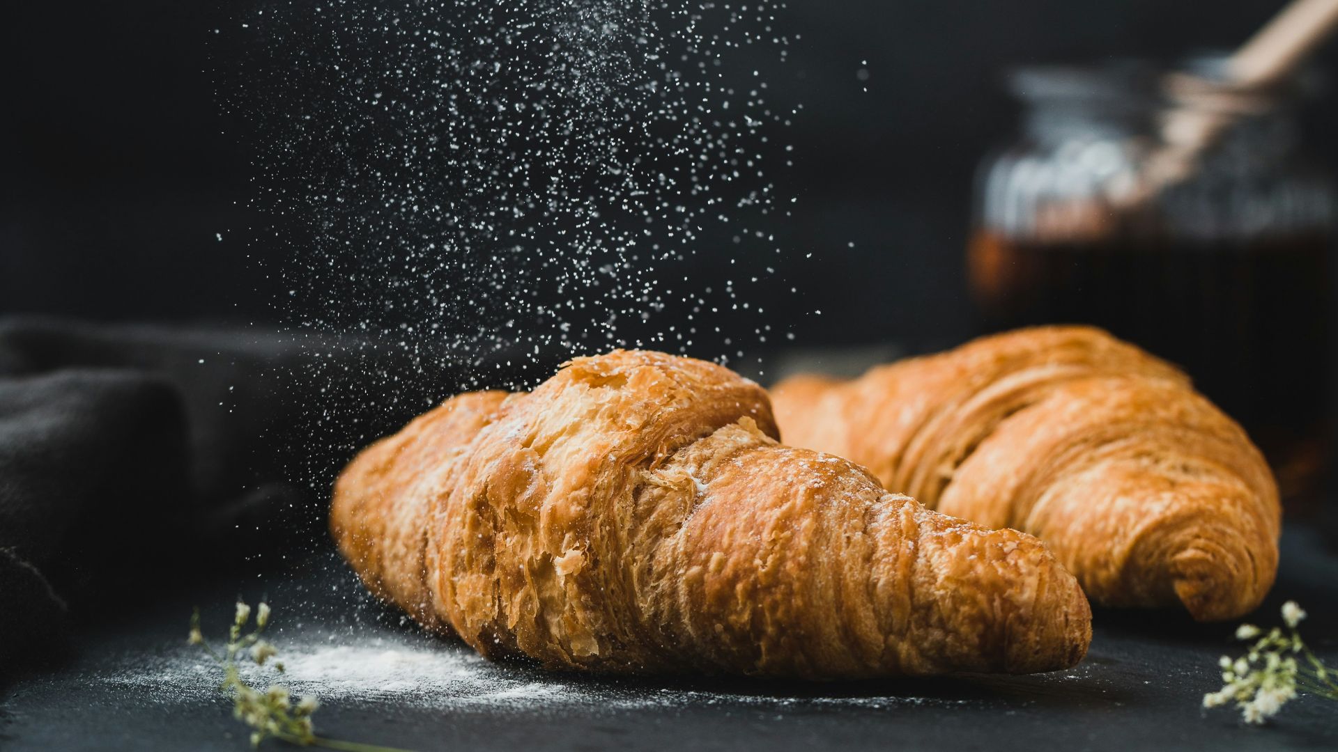 two brown croissants
