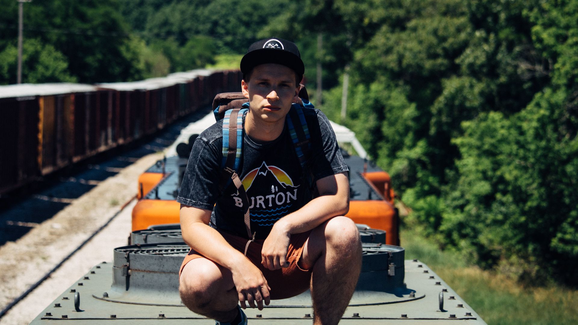 File:Train surfing backpacker (Unsplash).jpg
