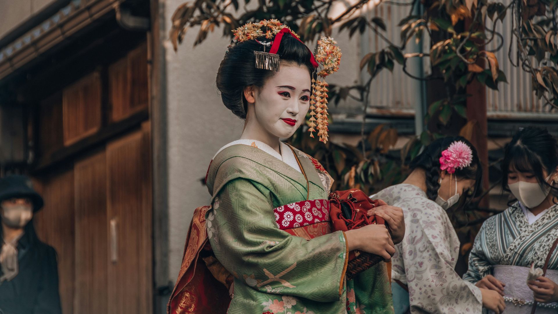 woman in green and red kimono