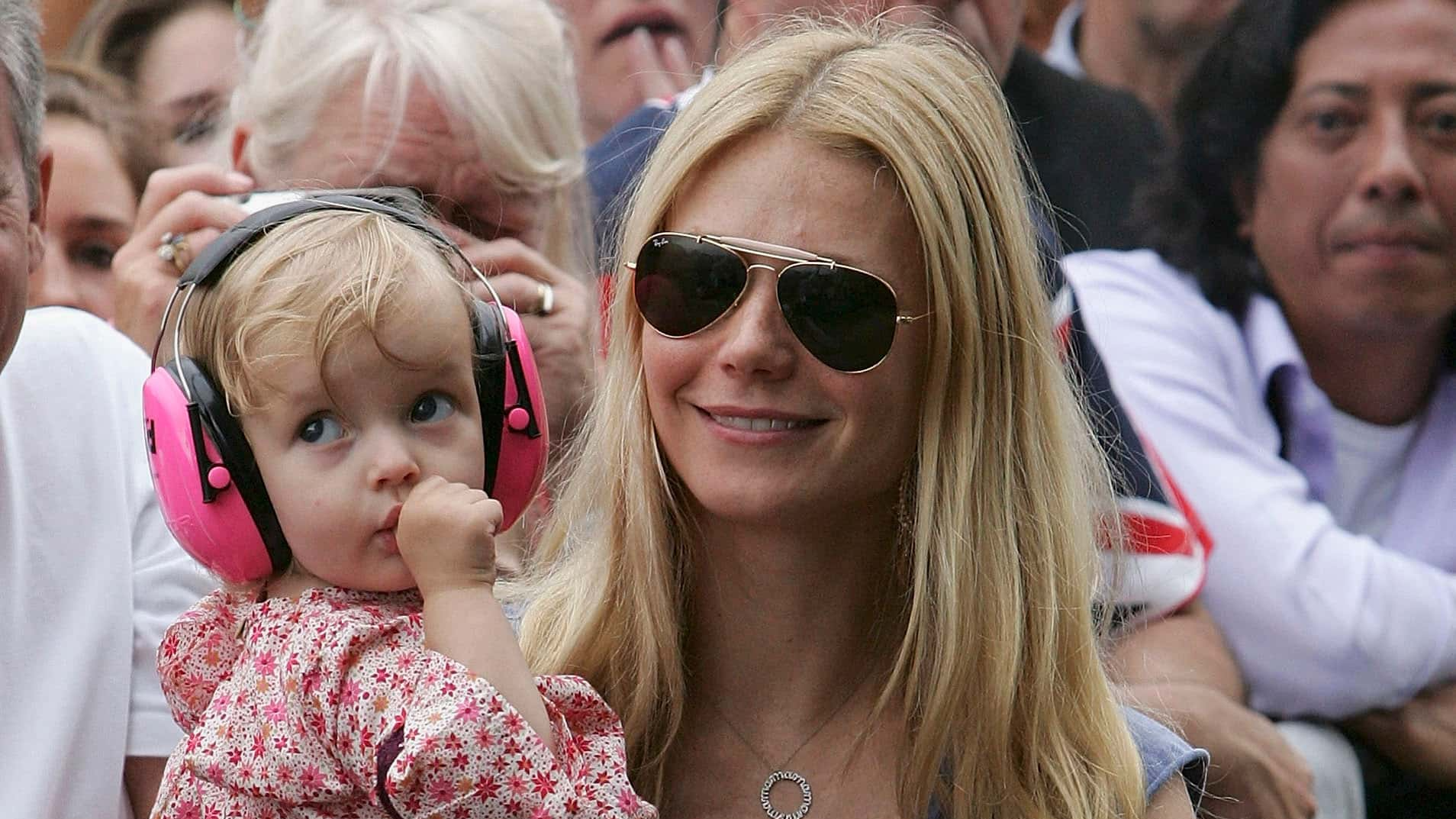 Actress Gwyneth Paltrow and daughter Apple watch Coldplay singer Chris Martin perform on stage at 