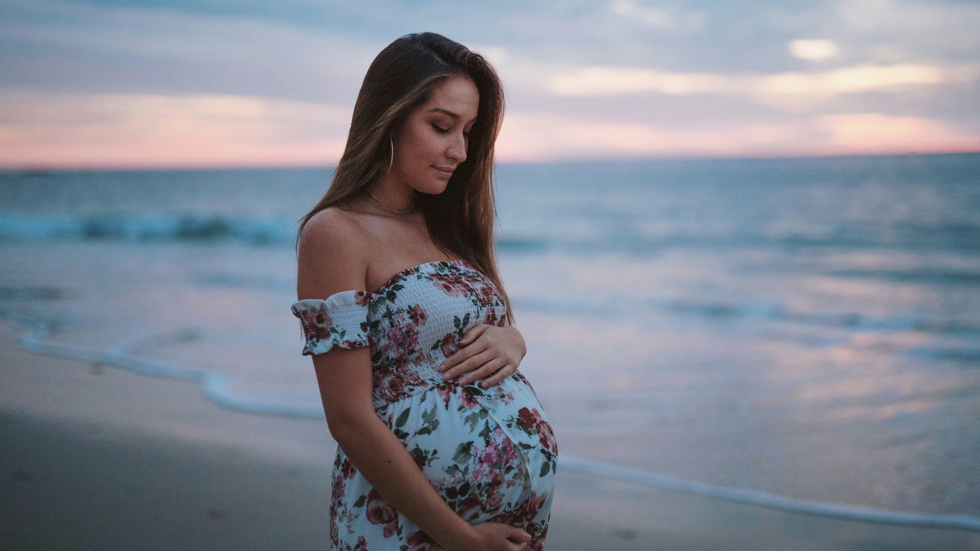 pregnant woman in seashore