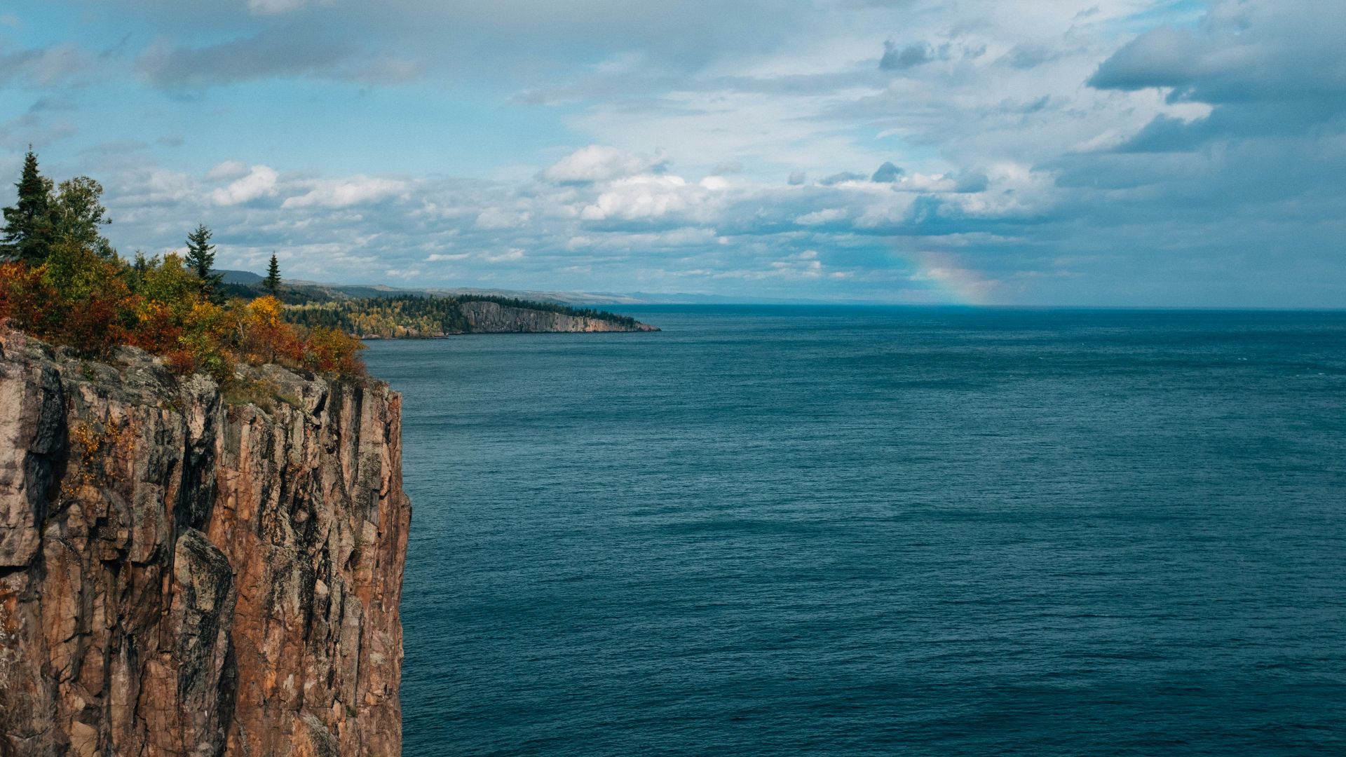 wavy body of water during daytime