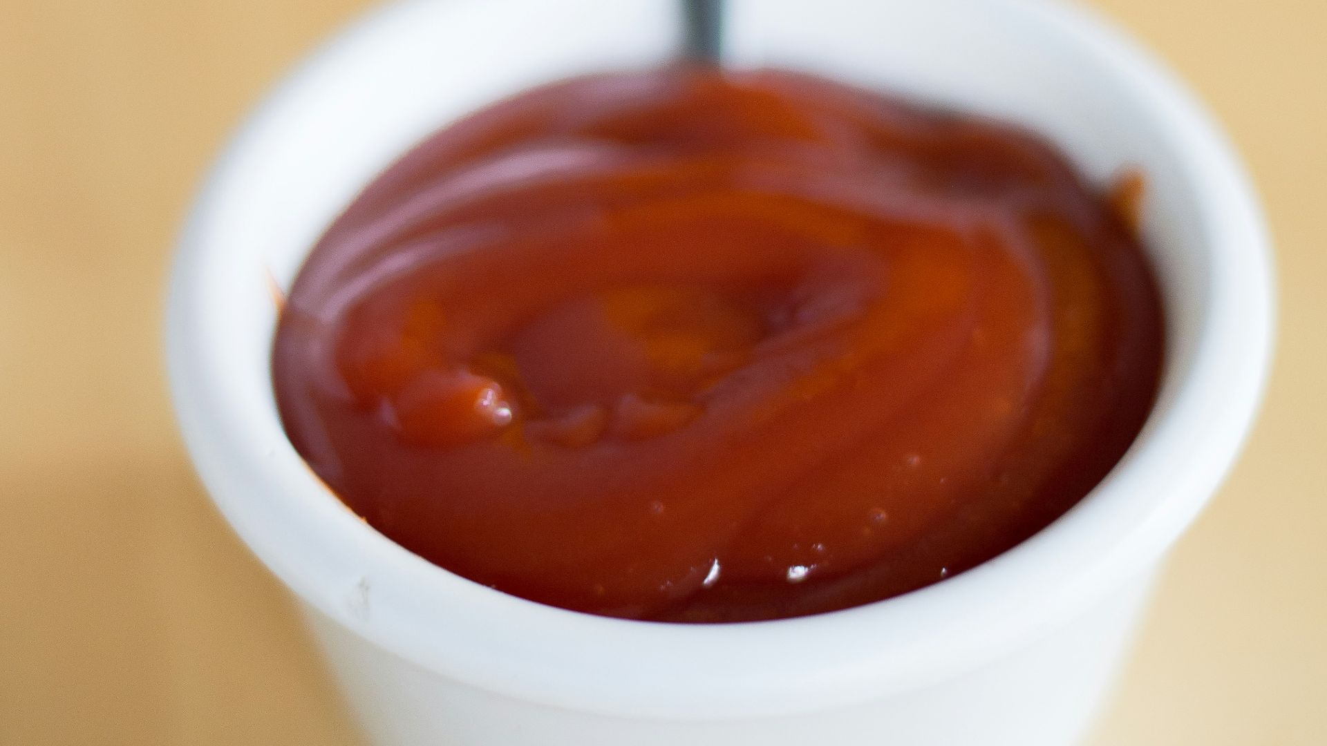 white ceramic mug with brown liquid