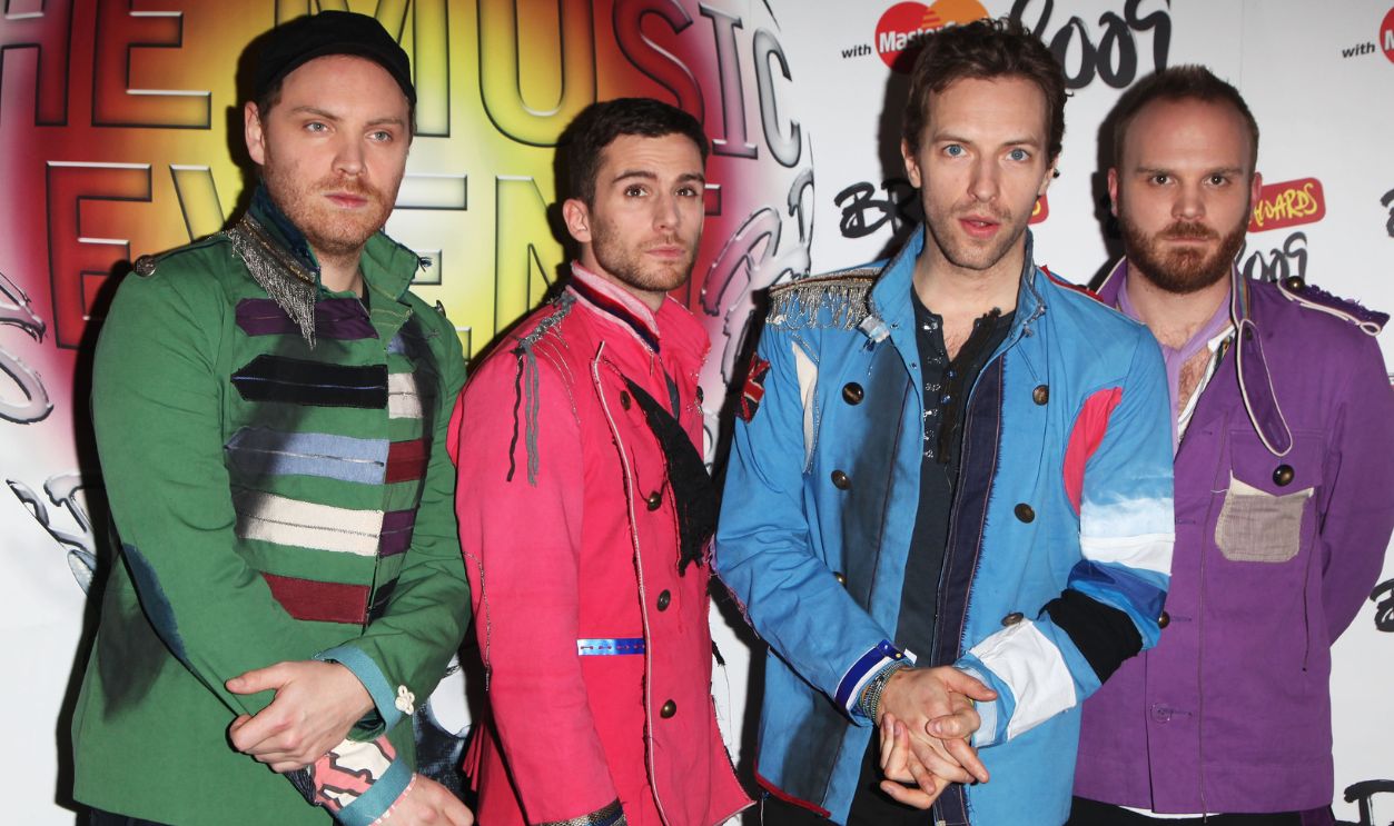 (L-R) Jonny Buckland, Guy Berryman, Chris Martin and Will Champion of Coldplay pose backstage during the Brit Awards 2009 at Earls Court on February 18, 2009 in London, England. 