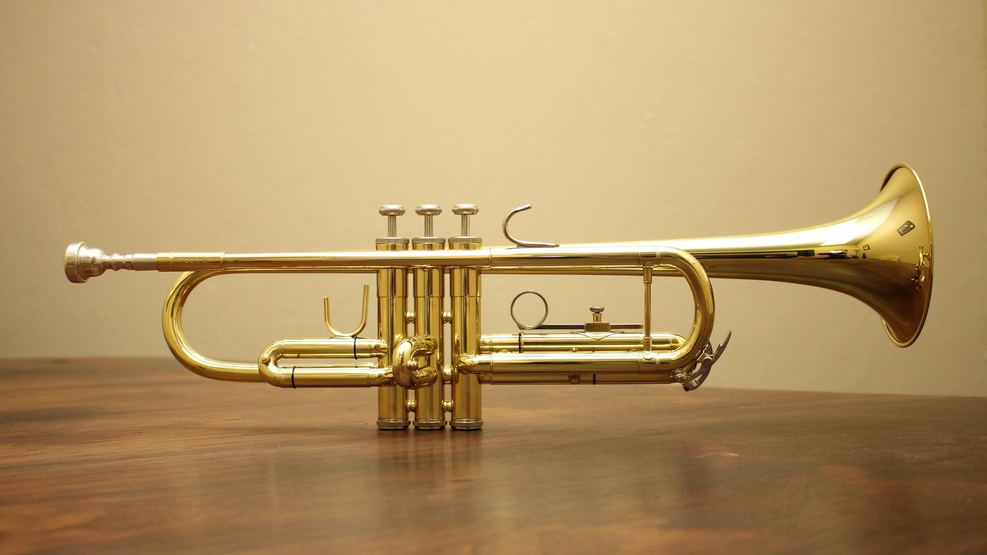 brass-colored trumpet