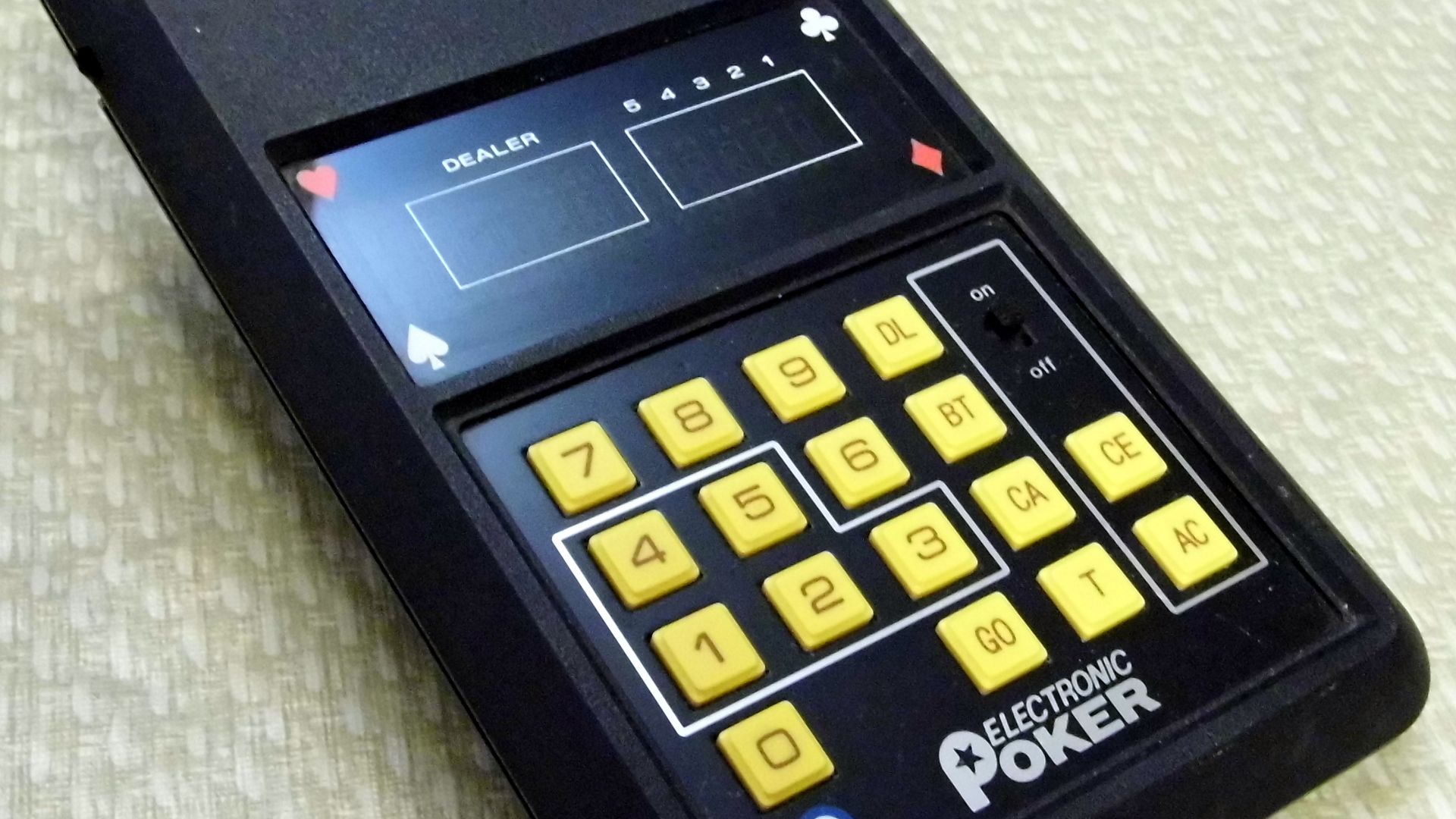File:Electronic Poker by Entex Industries, Made in Japan, Copyright 1979 (Handheld Electronic Game).jpg