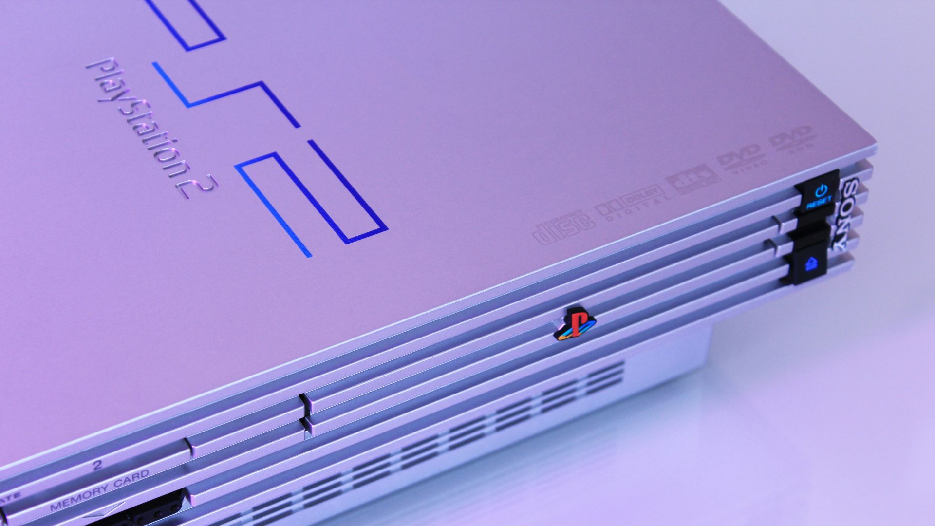 gray Sony PS2 console