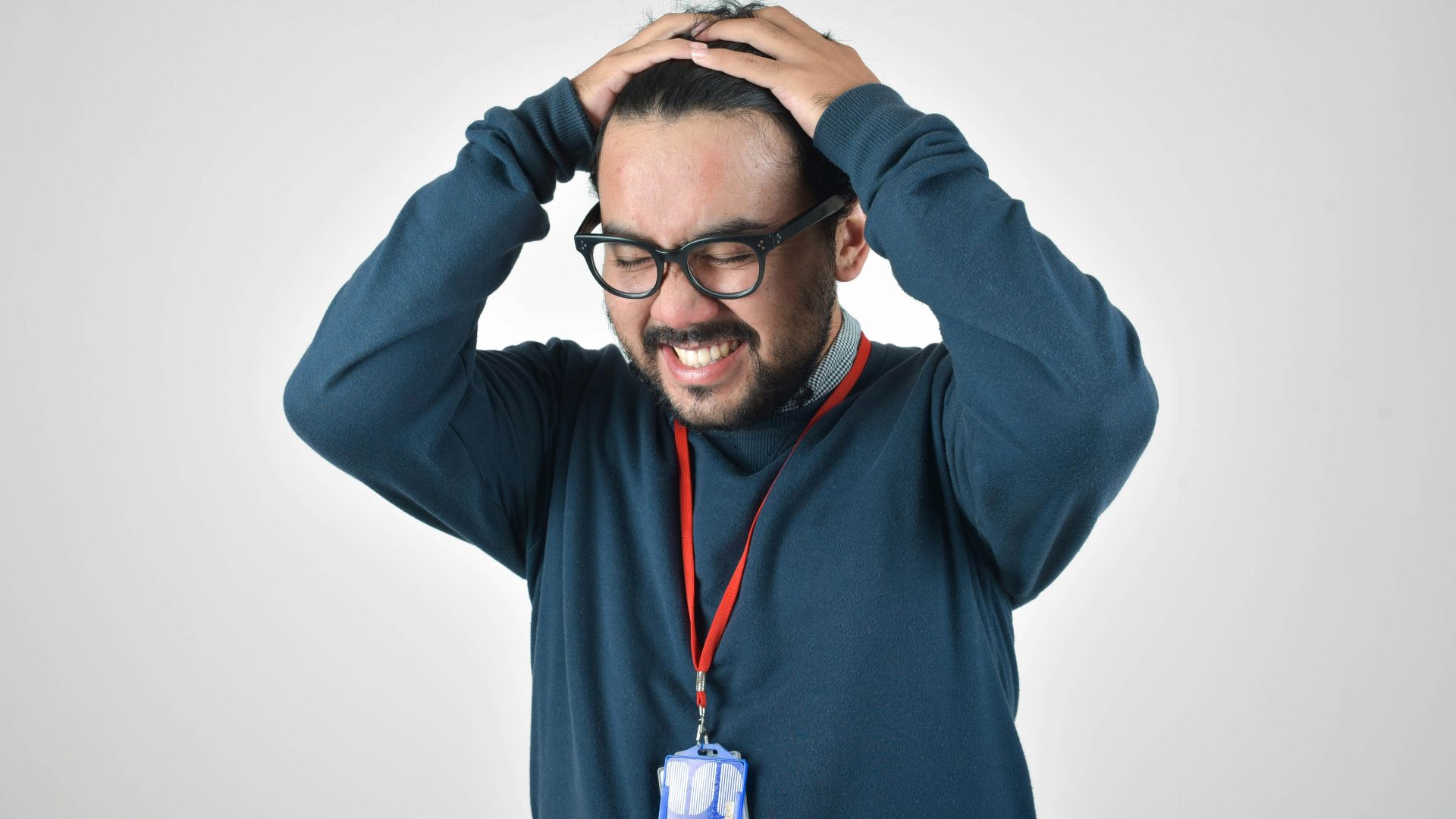 man in bluee ssweater