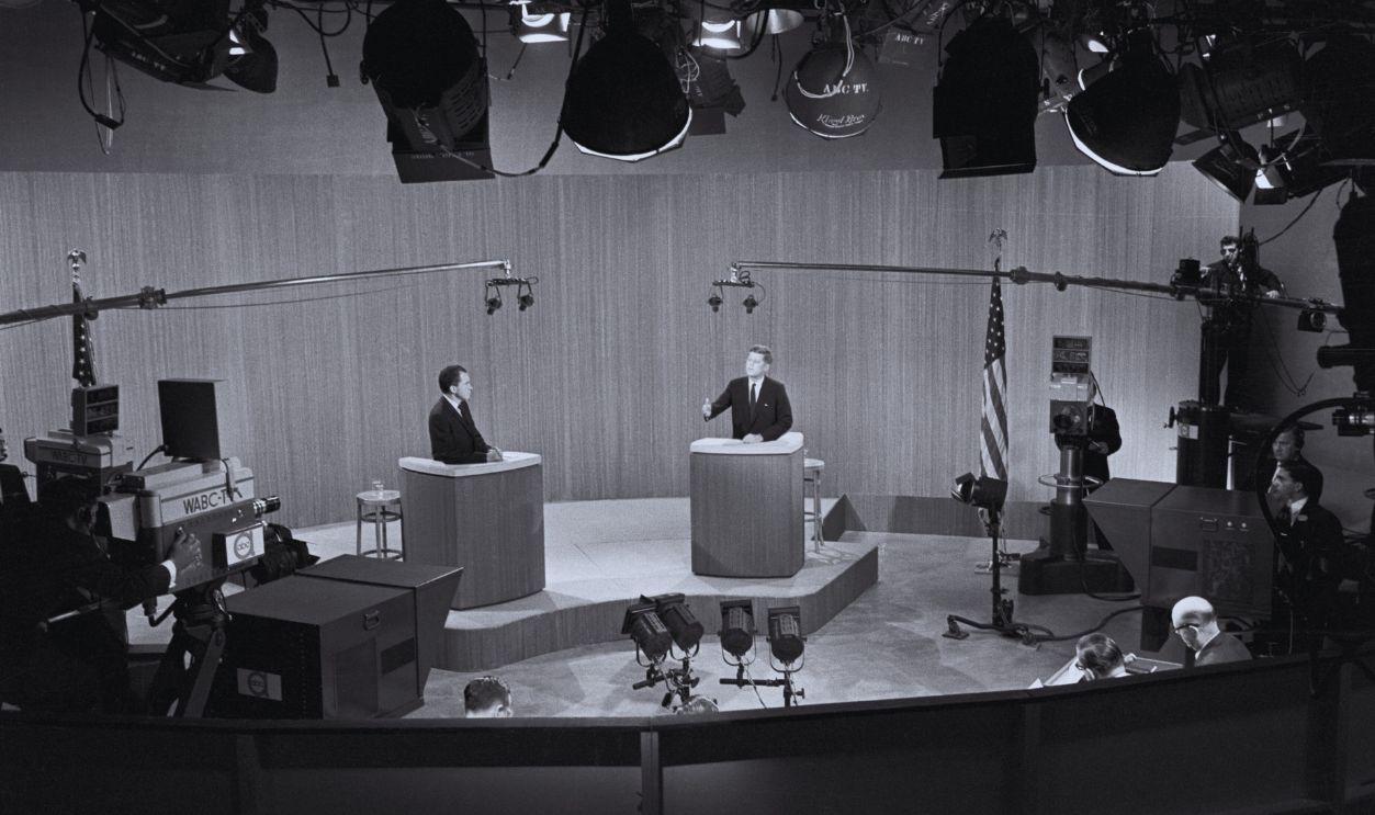 Gettyimages - 517354448, Nixon And Kennedy in Televised Debate Vice President Richard Nixon and Senator John F. Kennedy engage in a televised debate, the last in a series of four.
