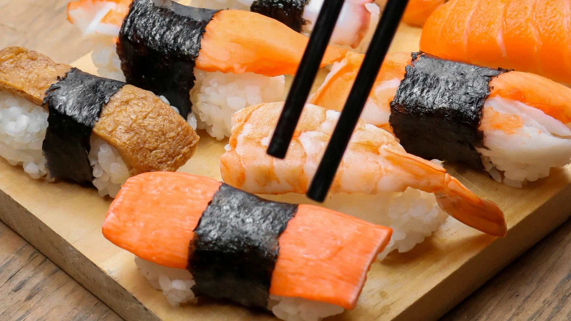 sushi on wooden tray
