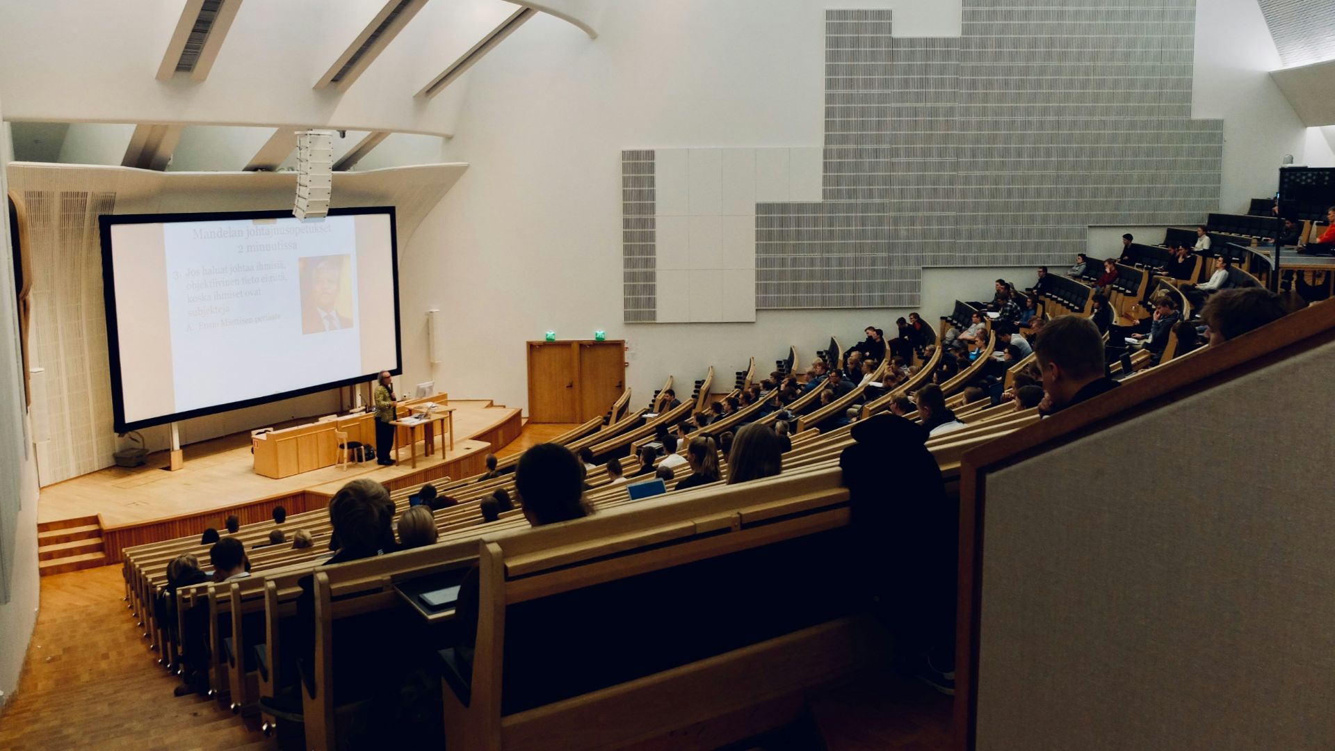 people sitting on chair in front of computer