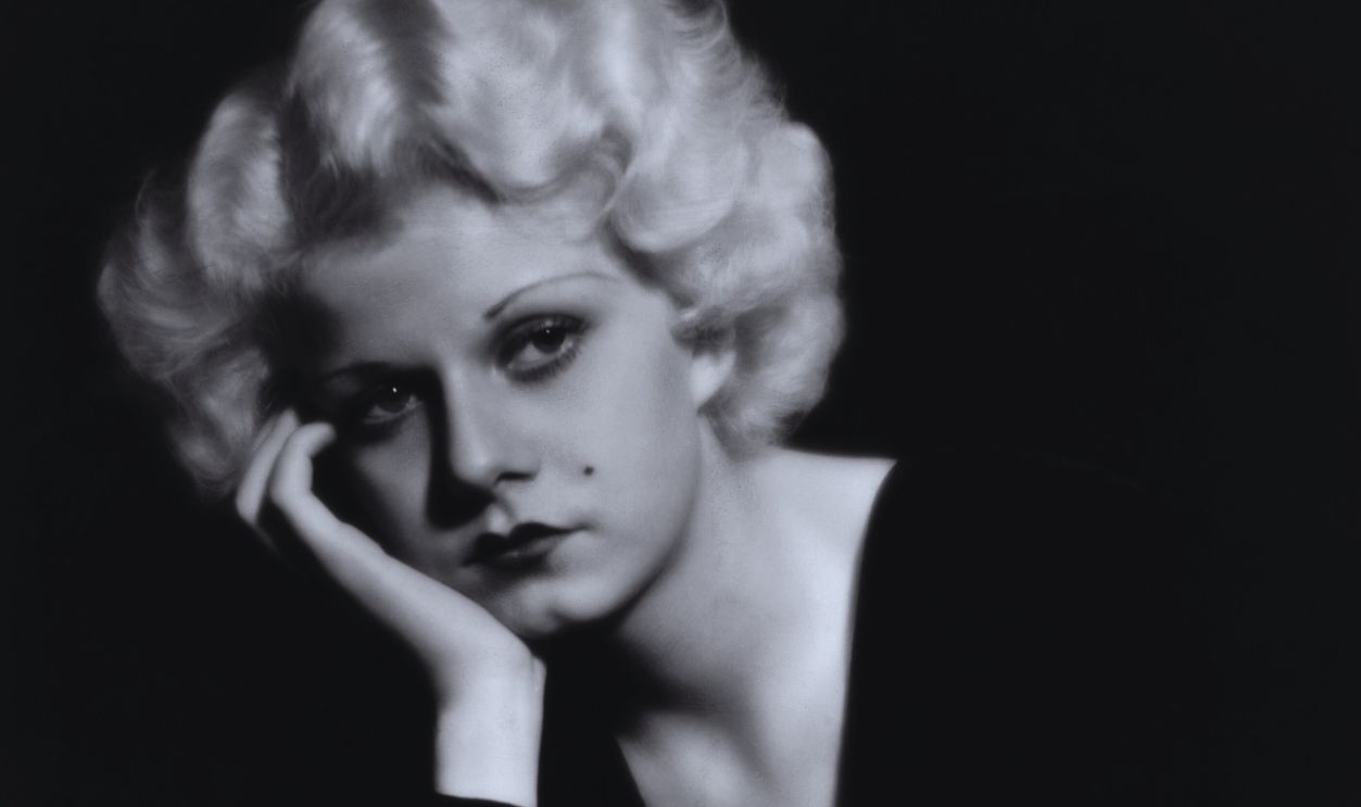 Gettyimages - 517350548, Jean Harlow in Pensive Pose (Original Caption) Portrait of Jean Harlow in a pensive pose, wearing a black v-necked dress. Undated photograph.