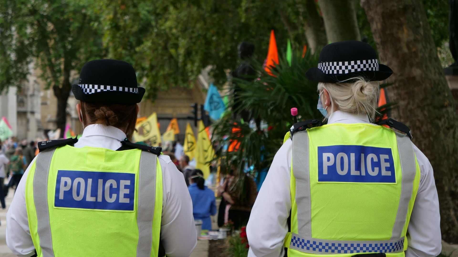 man in white and green adidas jersey shirt and black hat