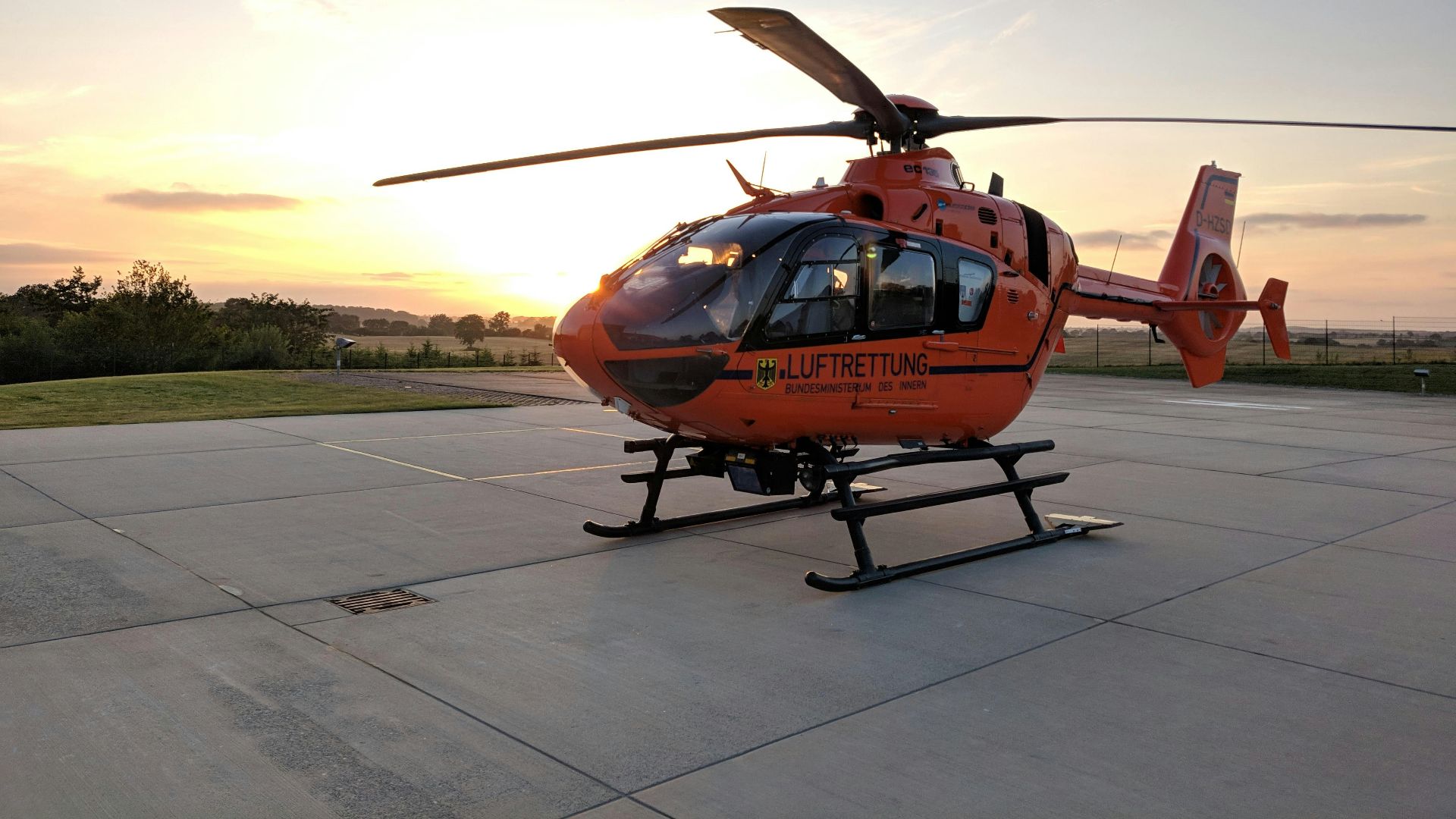 closeup photo of orange and black helicopter