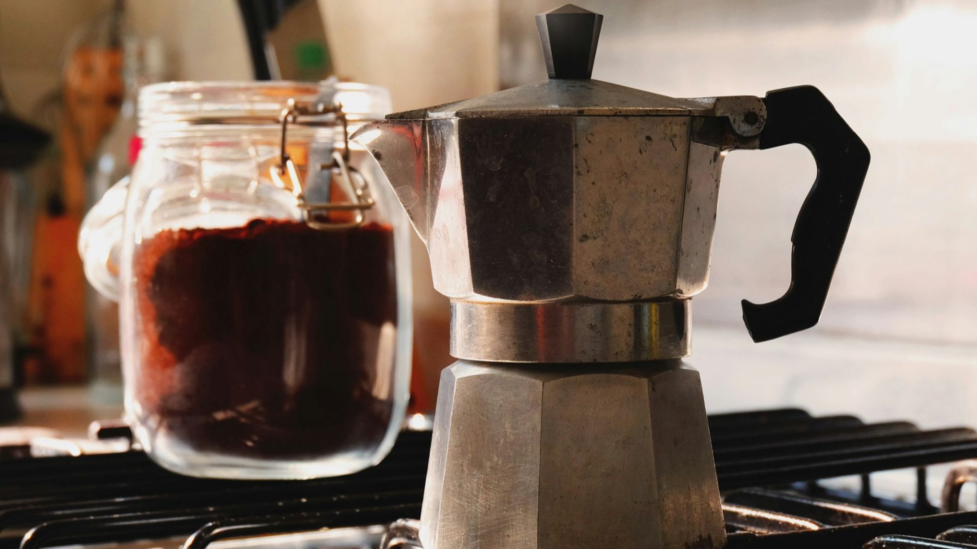 gray and black moka pot on top of gray gas range oven